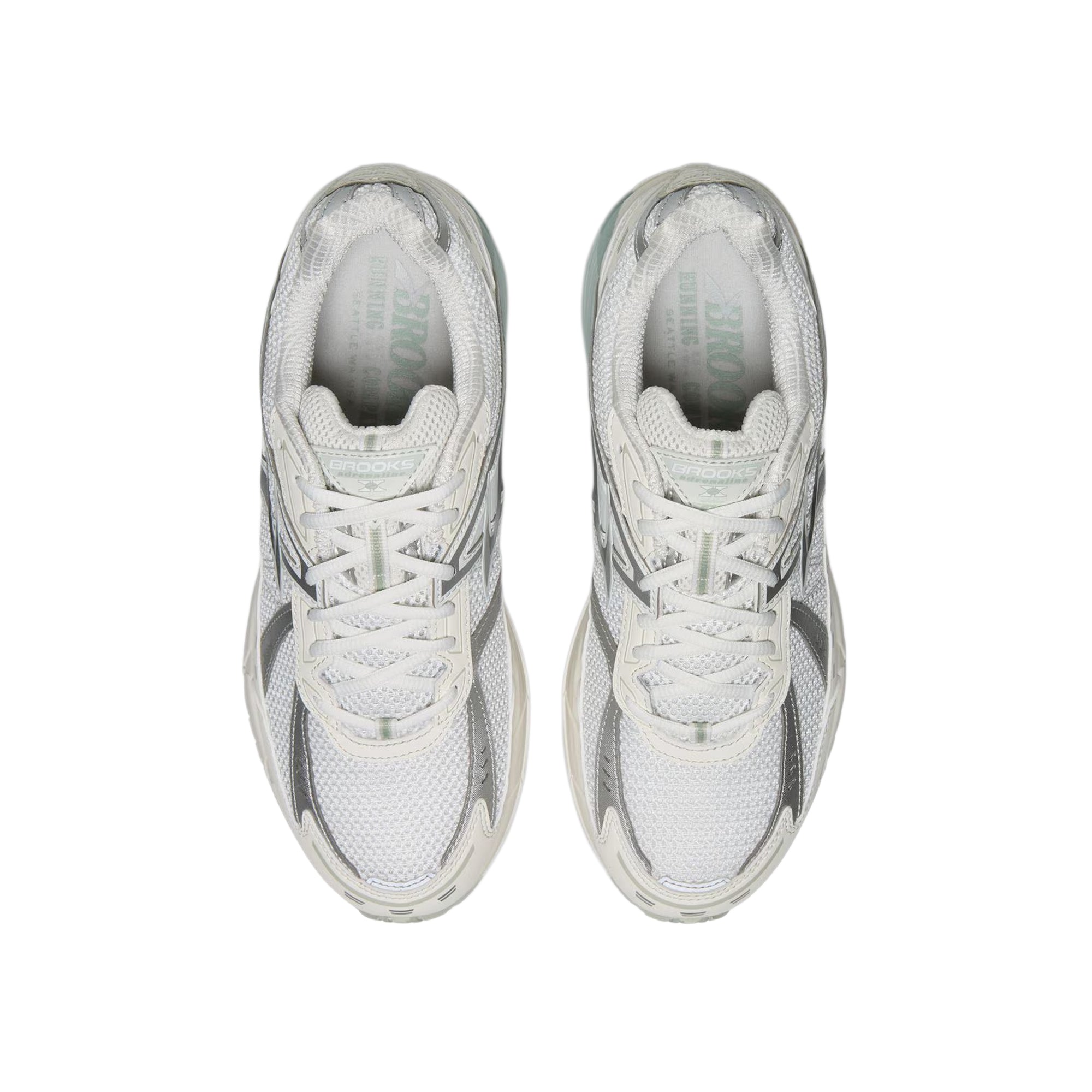 white and silver sneakers on a white background