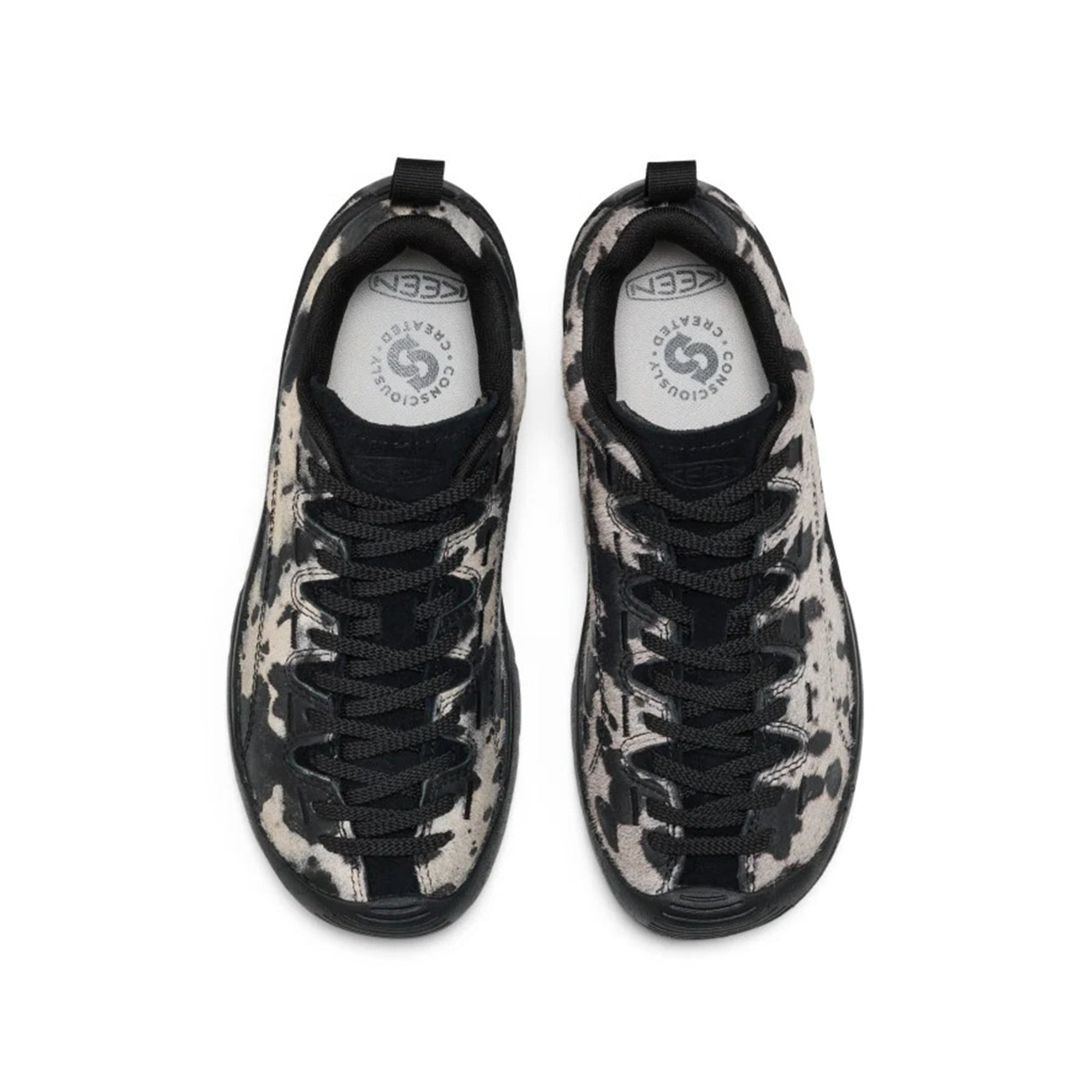 Cow printed Black Sneakers on a white background