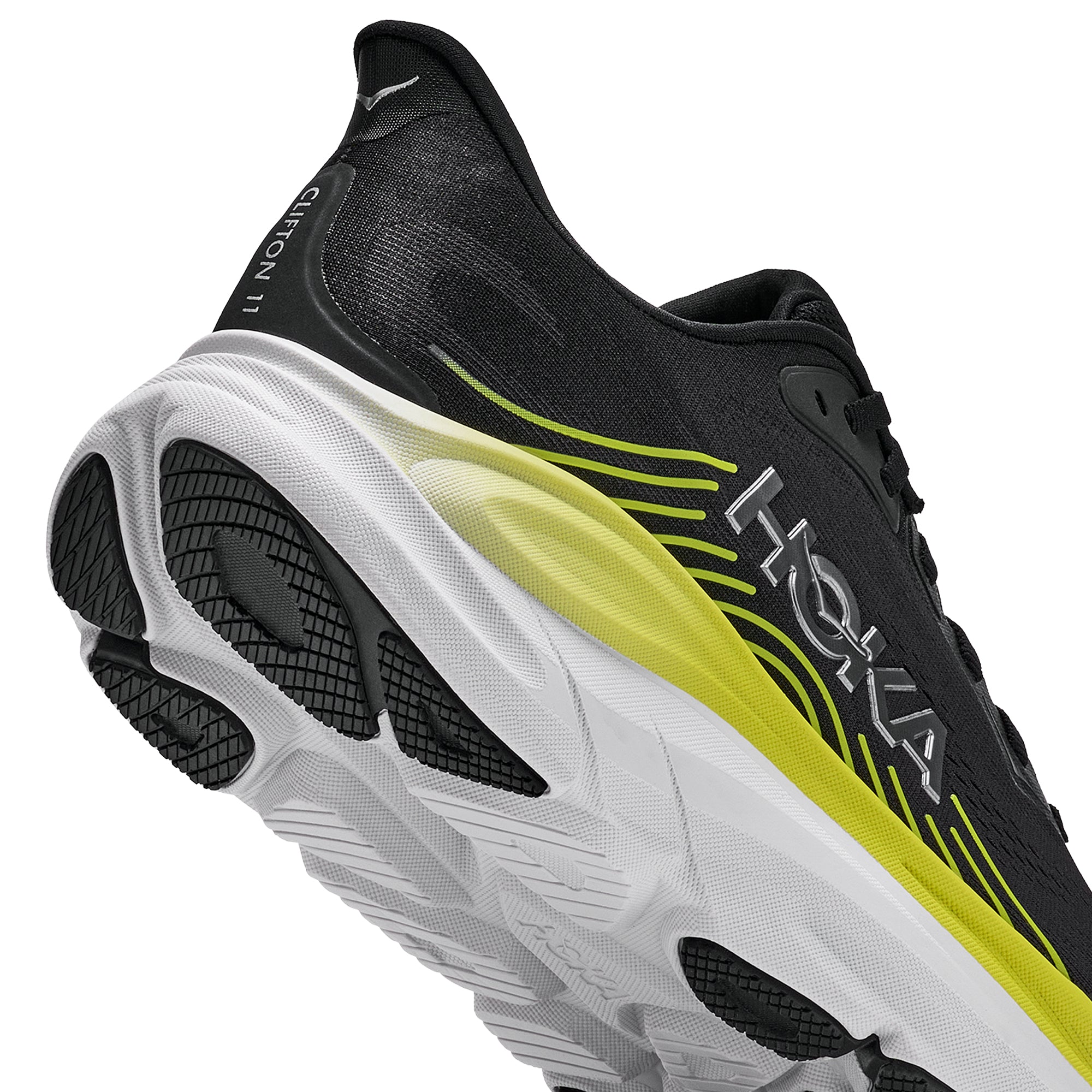 Black yellow grey sneakers on a white background