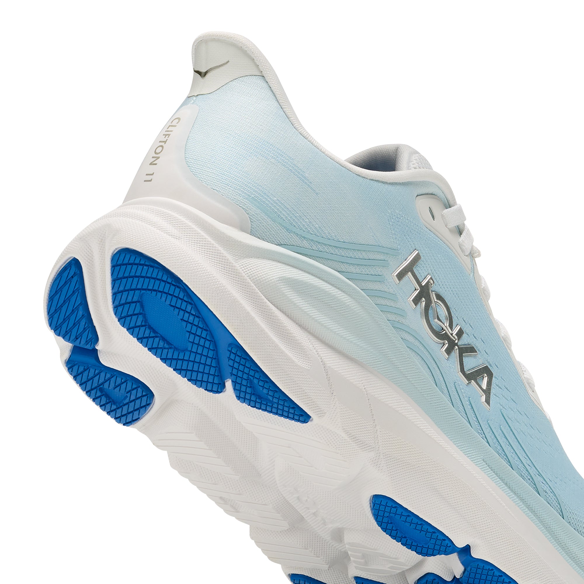 light blue and white sneakers on a white background
