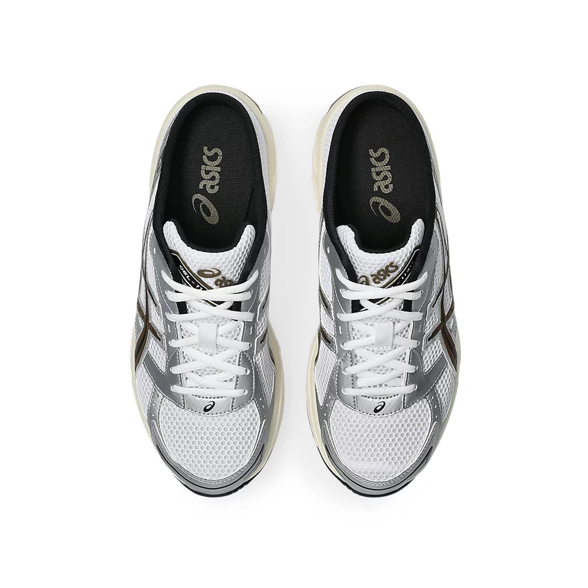 white, brown and silver sneaker mule on a white background
