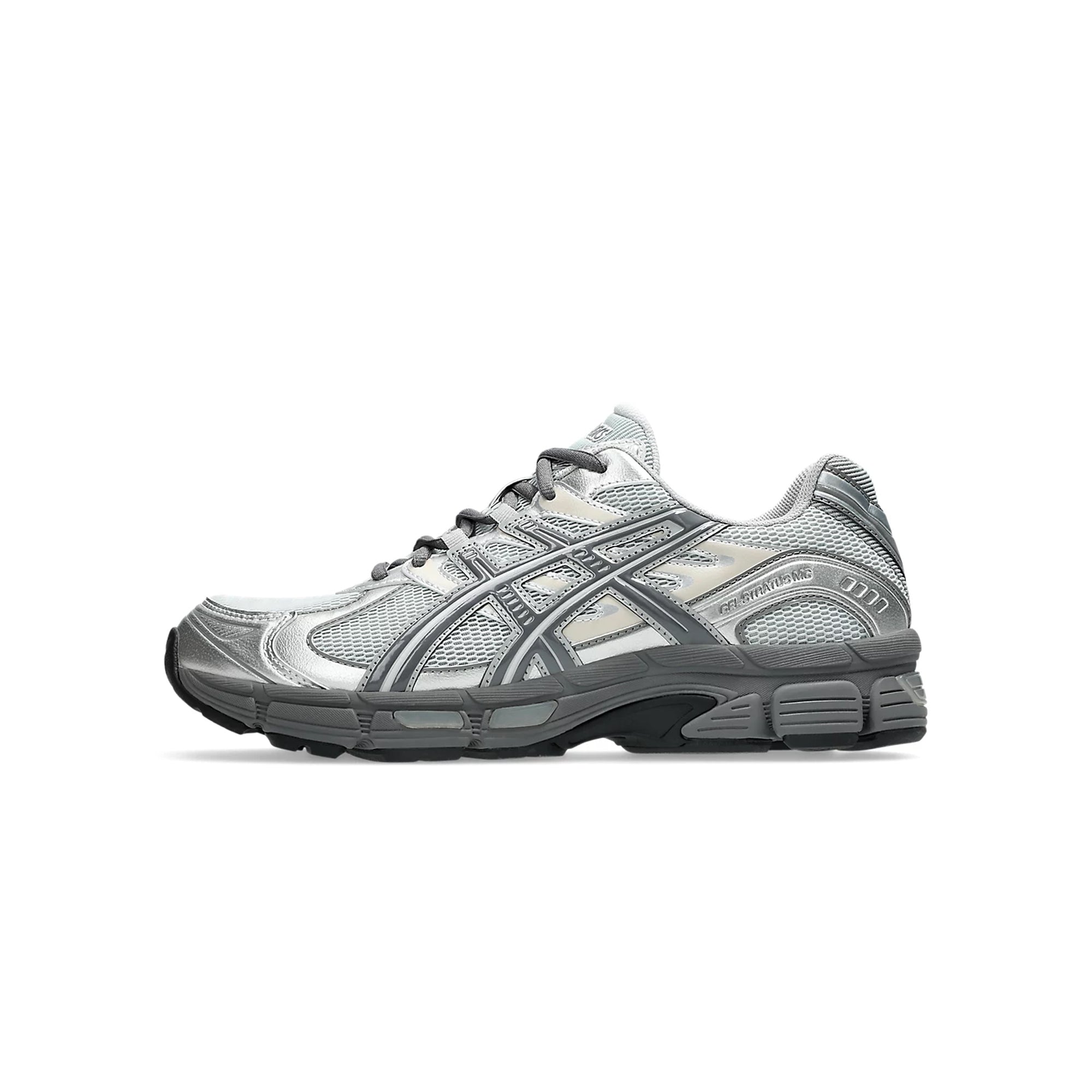 Grey and silver sneakers on white a background