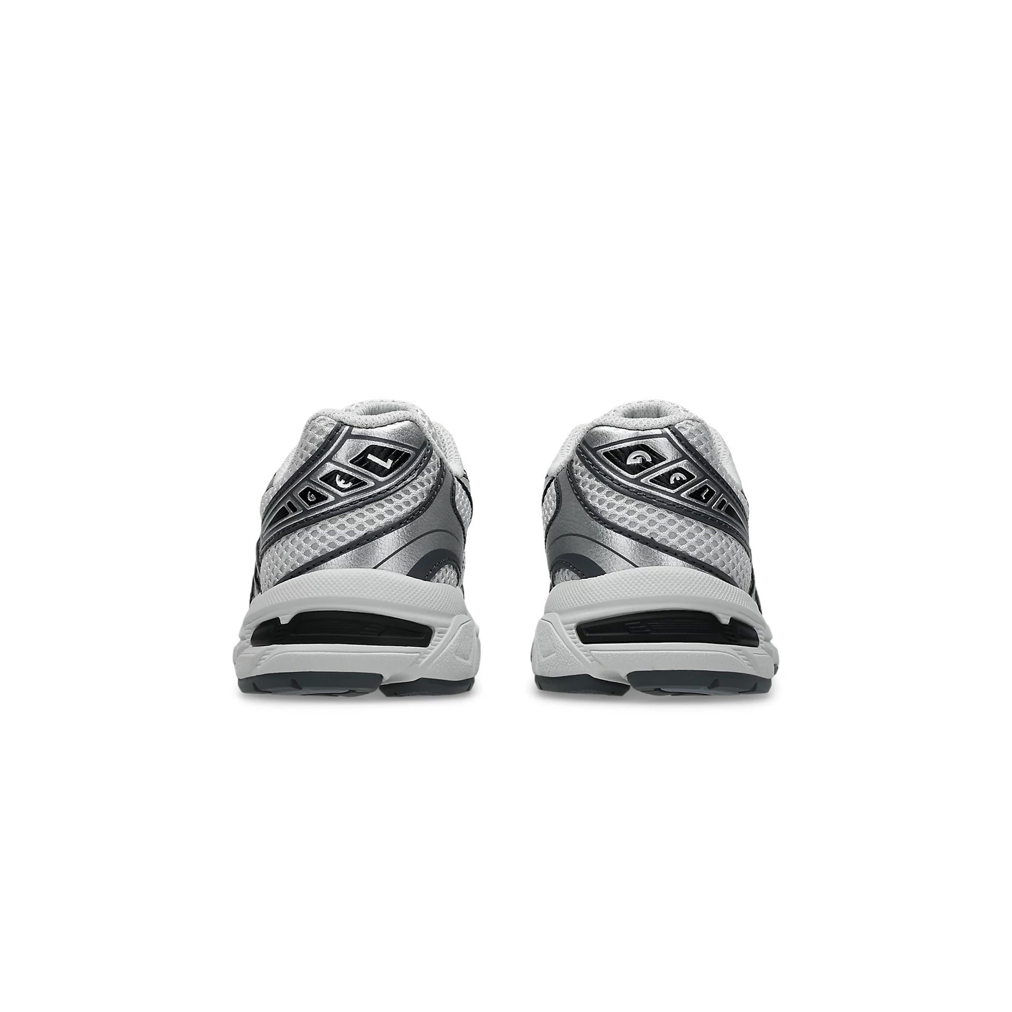 grey and silver sneakers on a white background