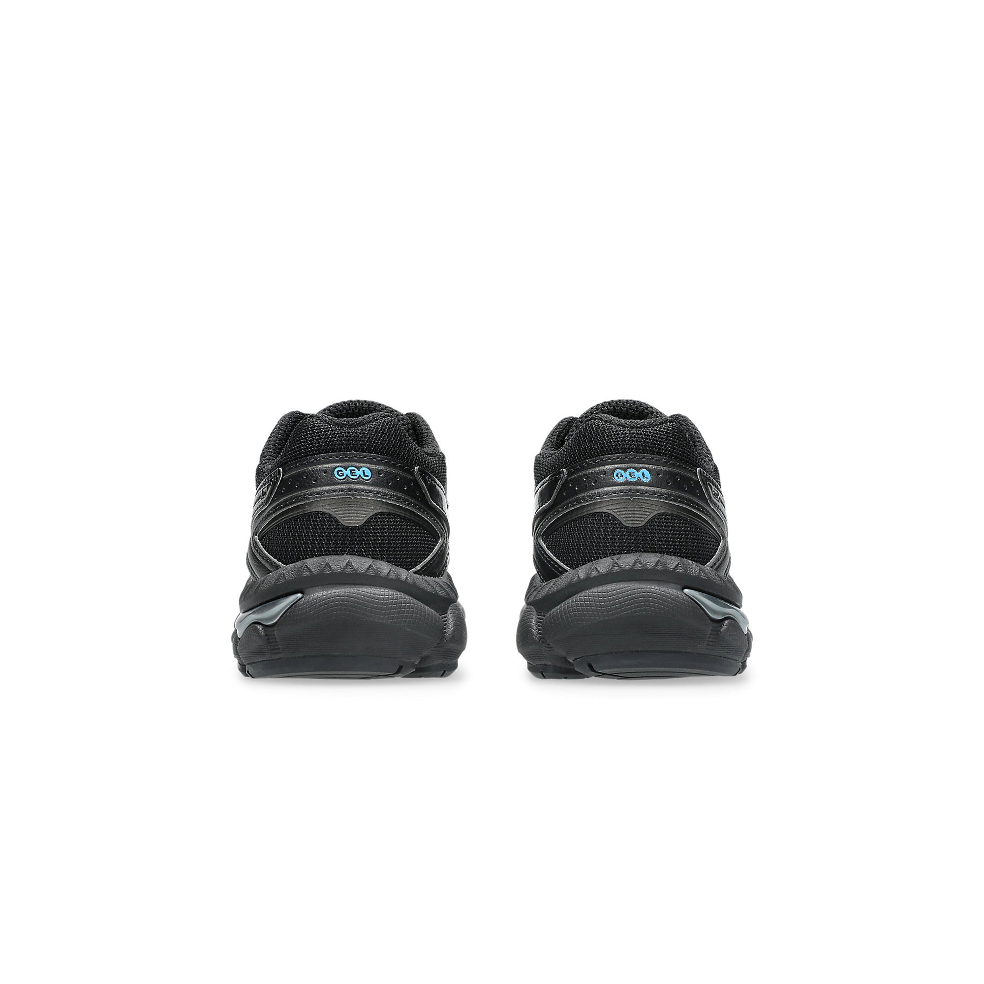 Black and gunmetal sneakers on a white background