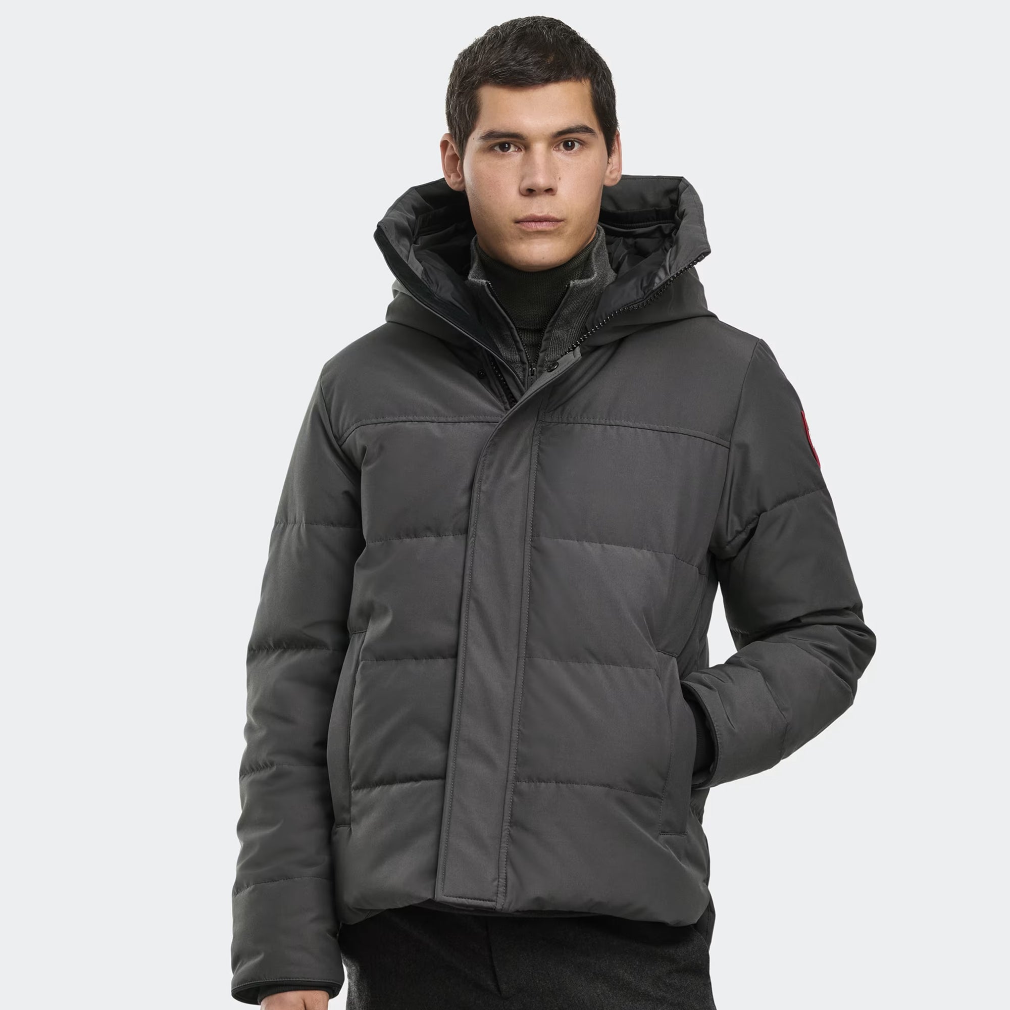 person wearing a Grey jacket on a white background