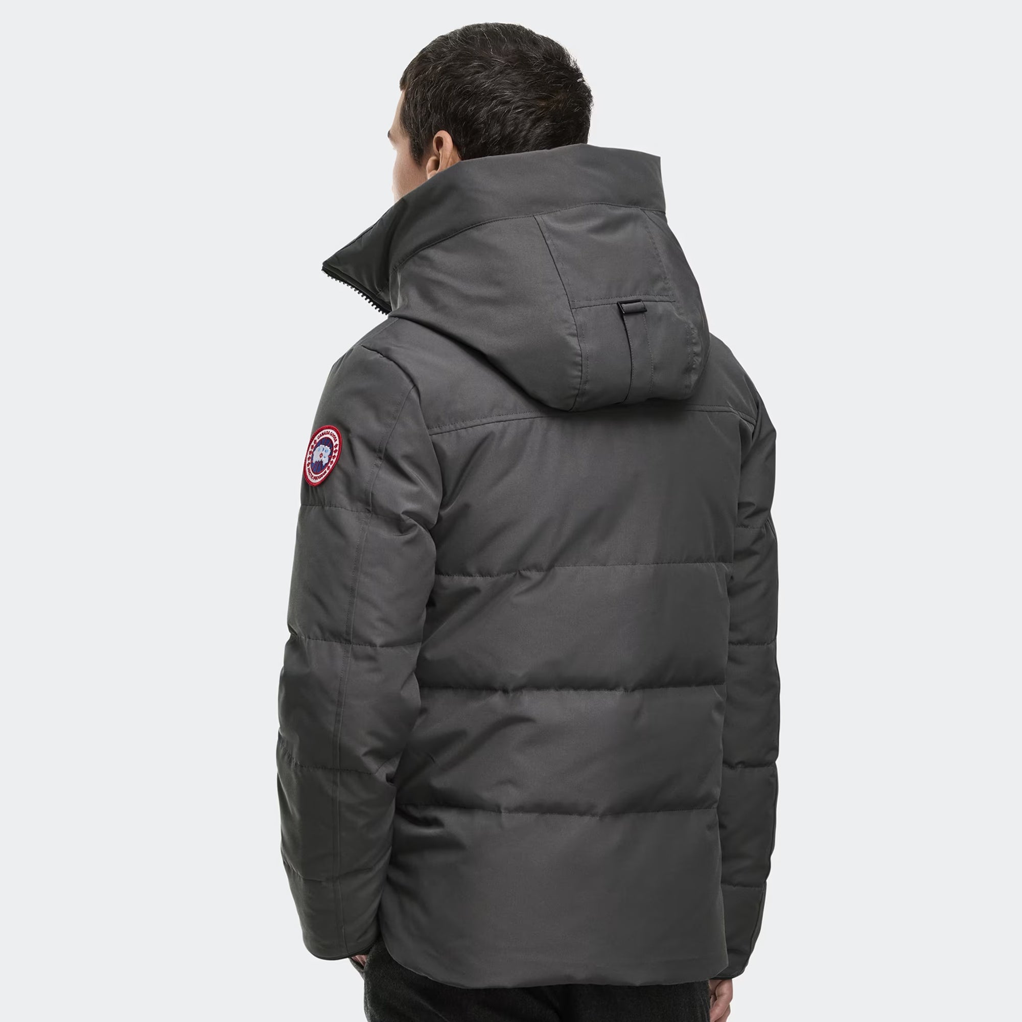 person wearing a Grey jacket on a white background