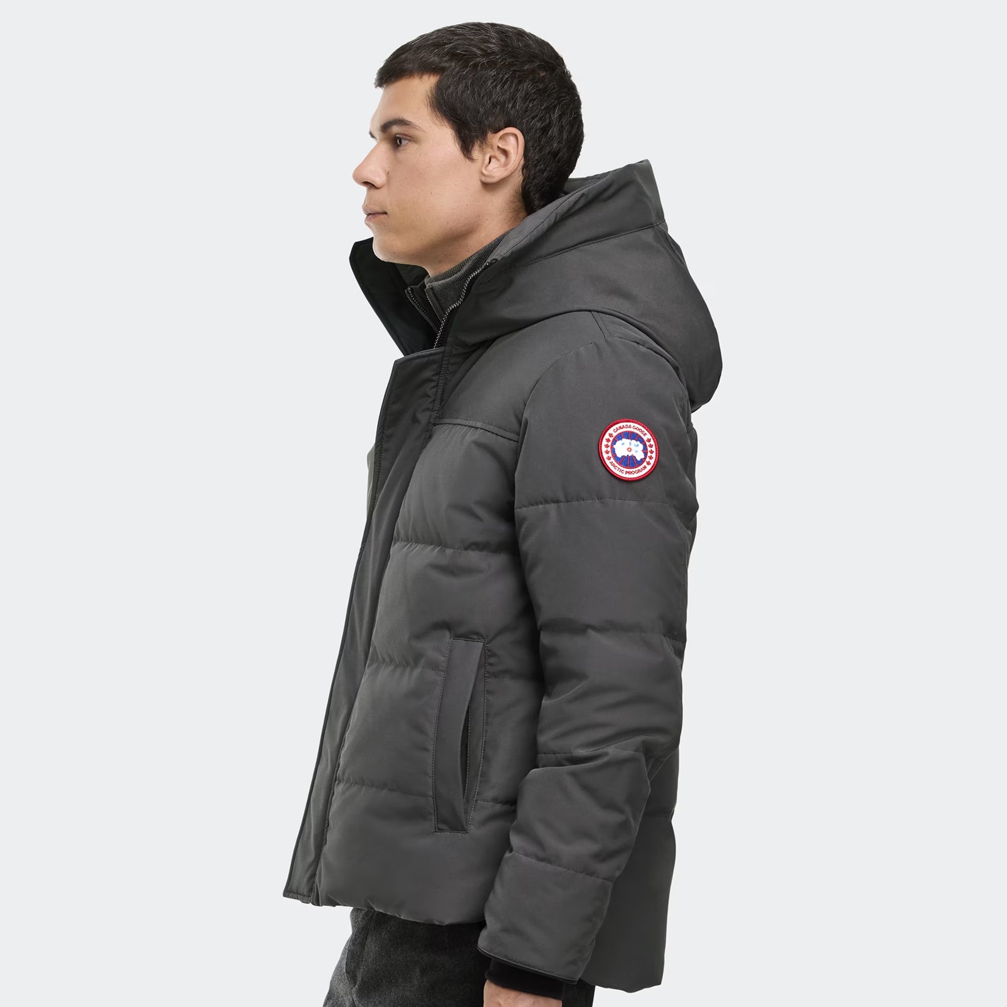 person wearing a Grey jacket on a white background
