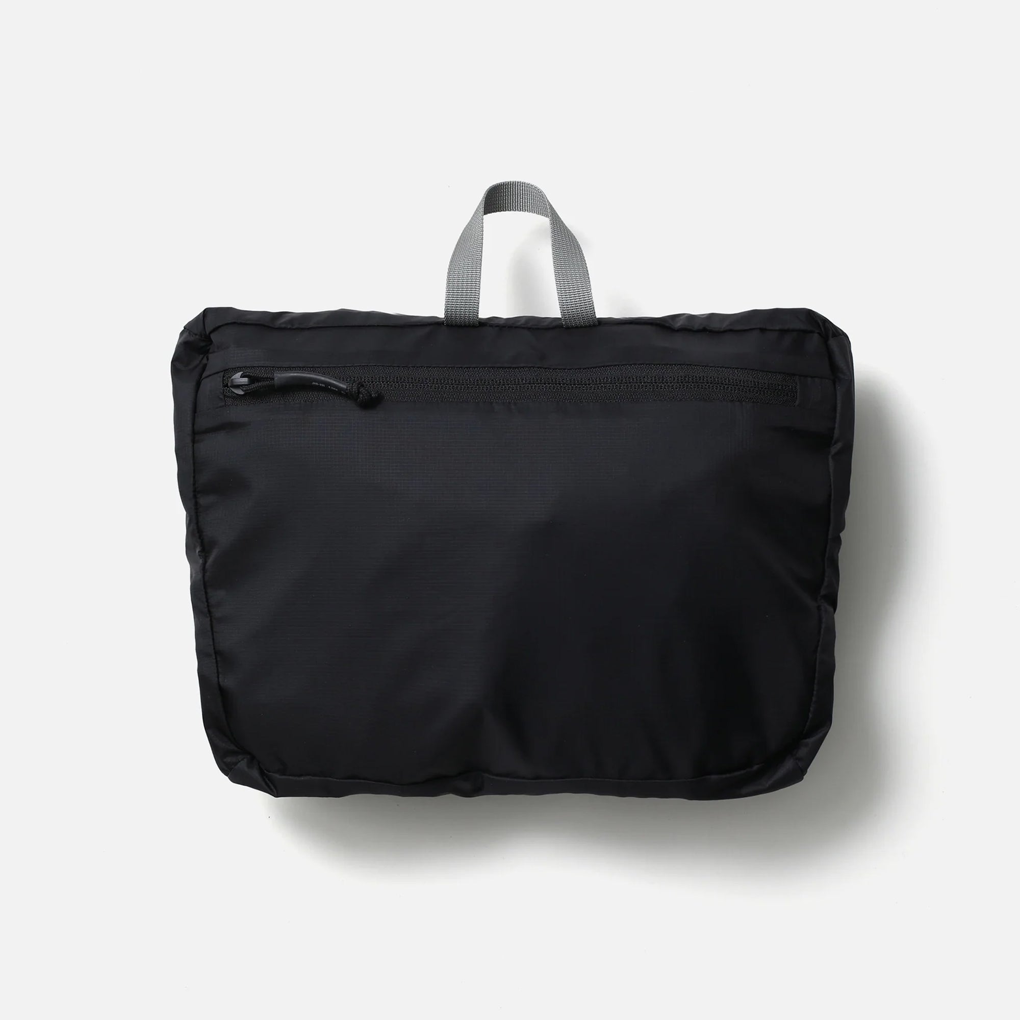 Black backpack on a white background