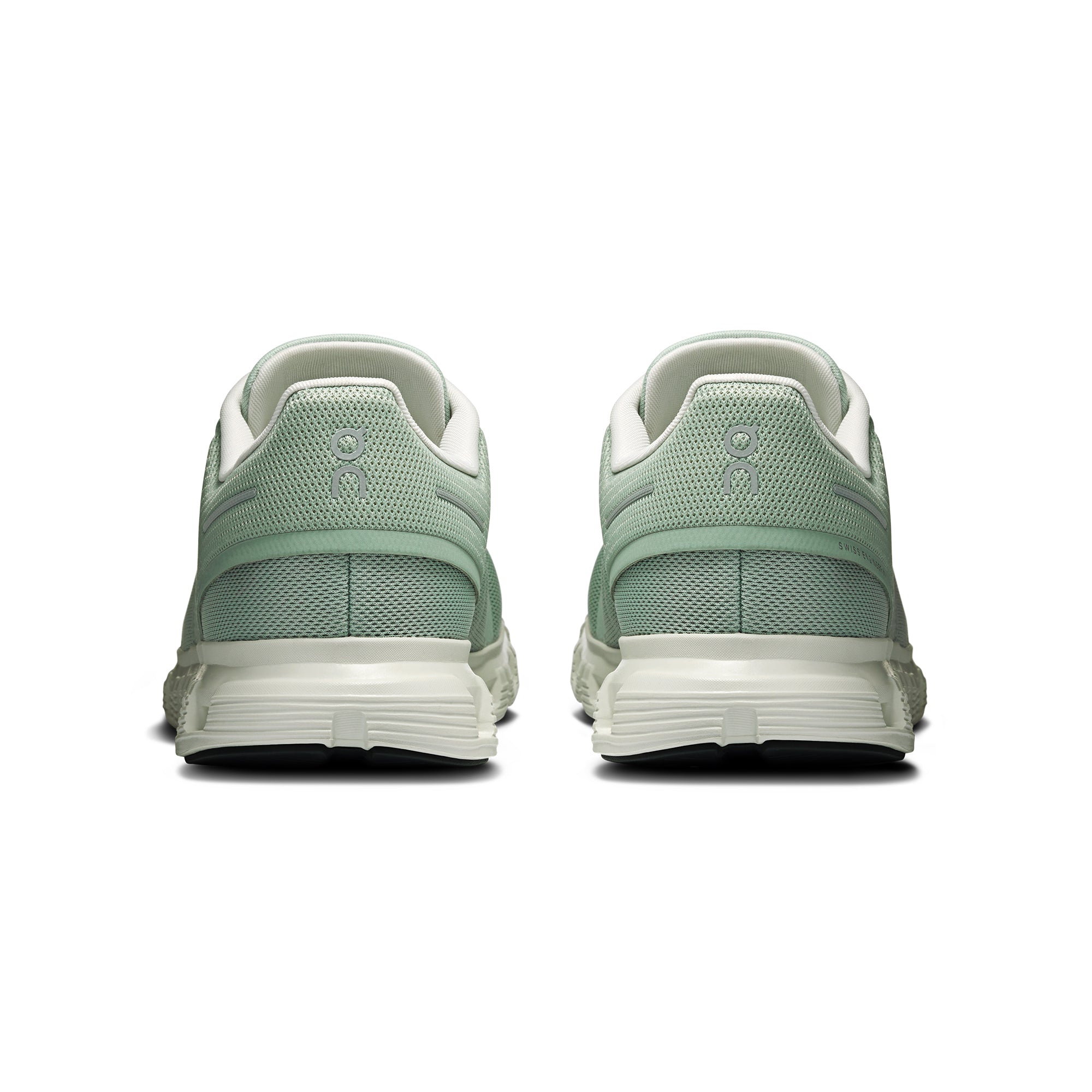 mint green and white sneakers on a white background