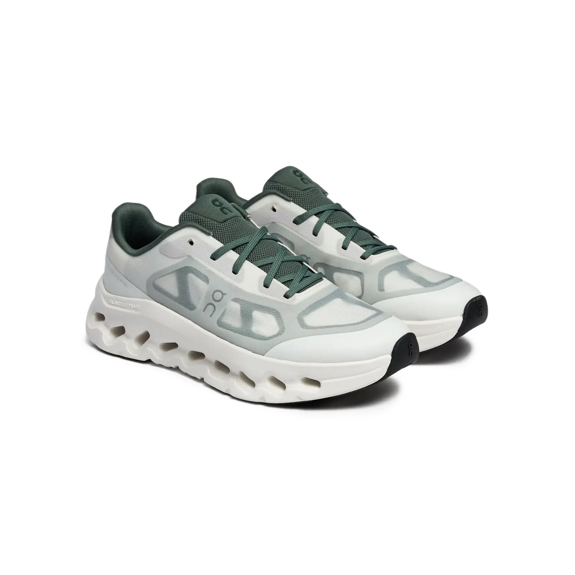green & beige sneakers on a white background