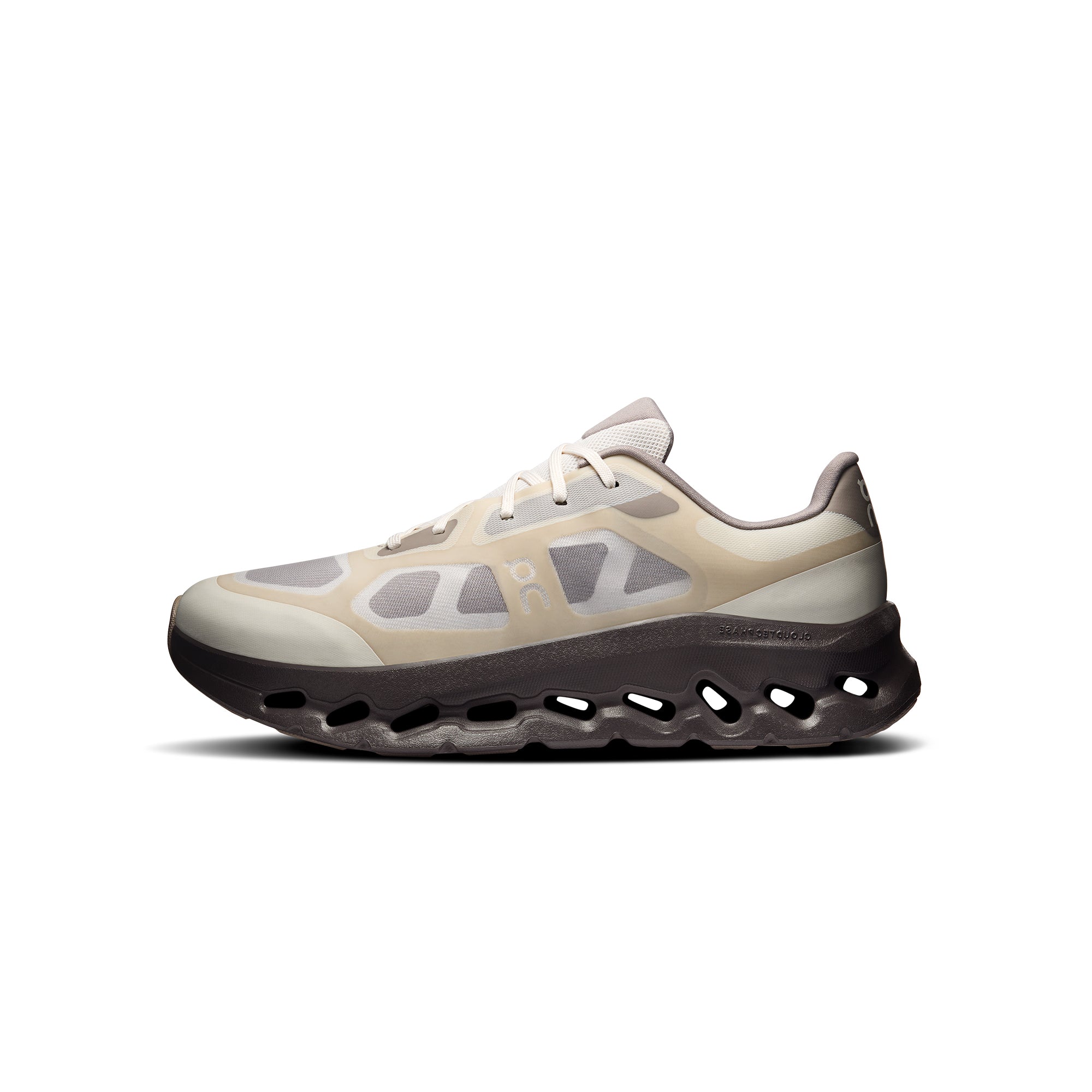 tan and brown sneakers on a white background
