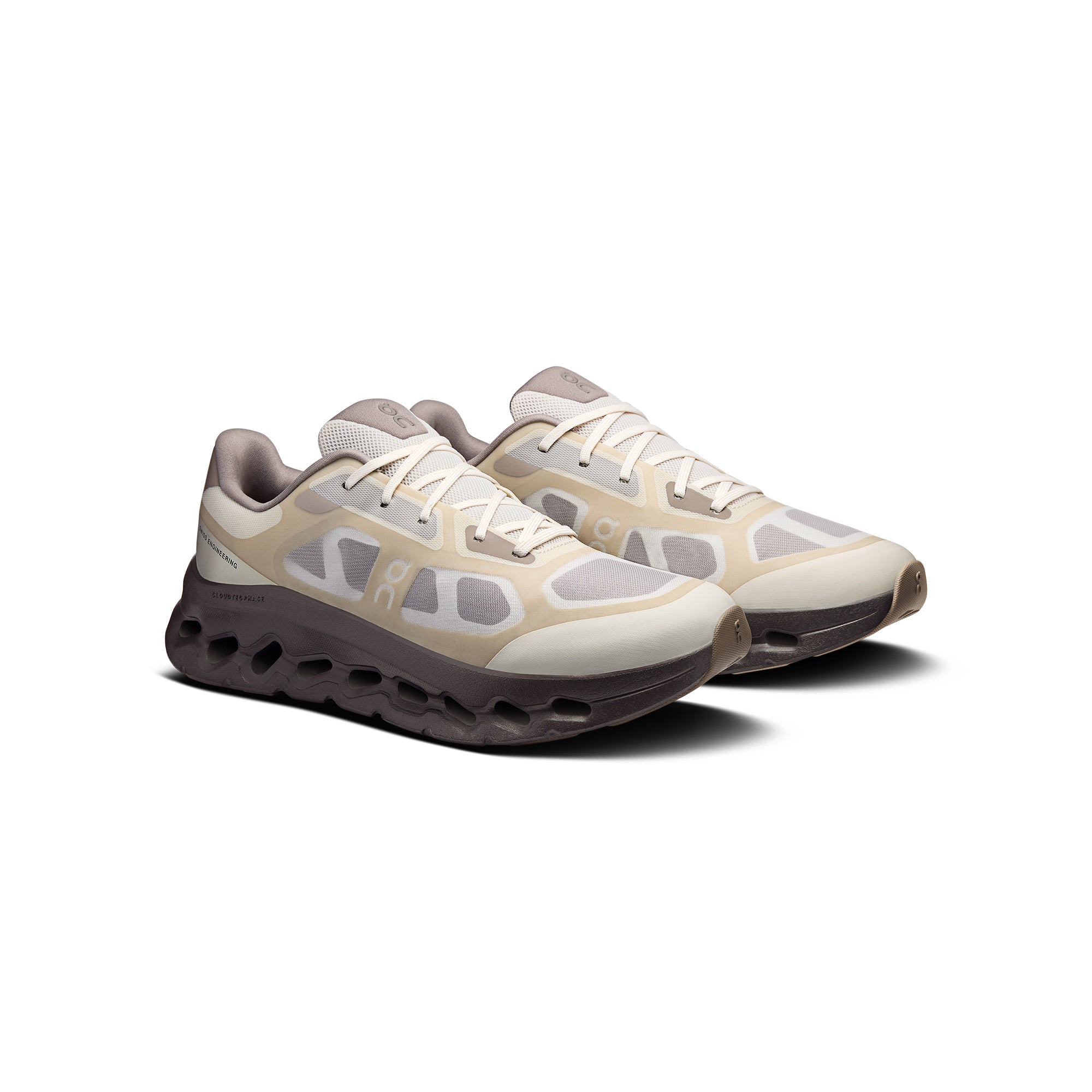 tan and brown sneakers on a white background