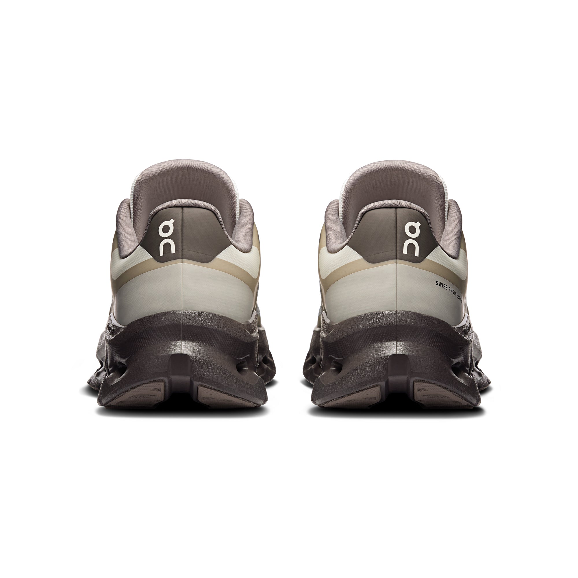 tan and brown sneakers on a white background