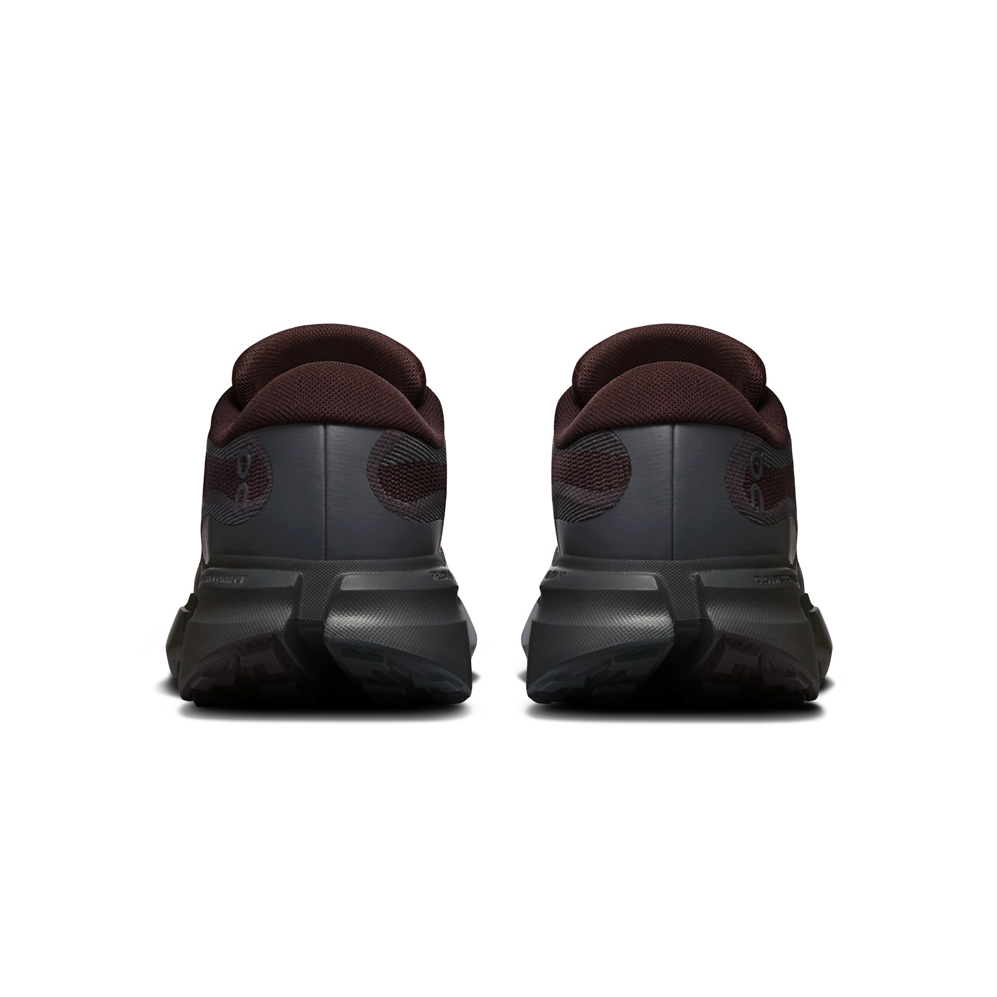 black and brown sneakers on a white background