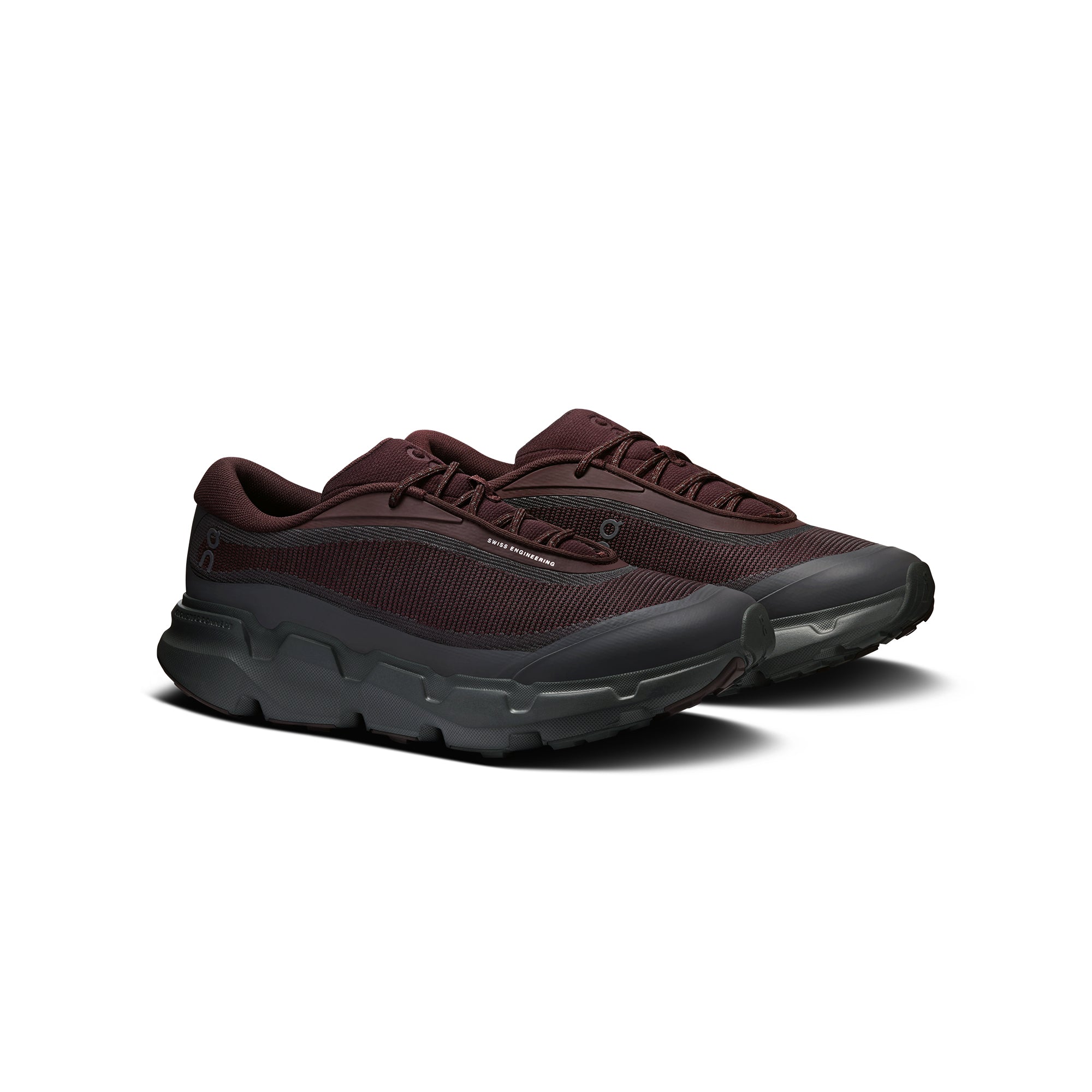 black and brown sneakers on a white background