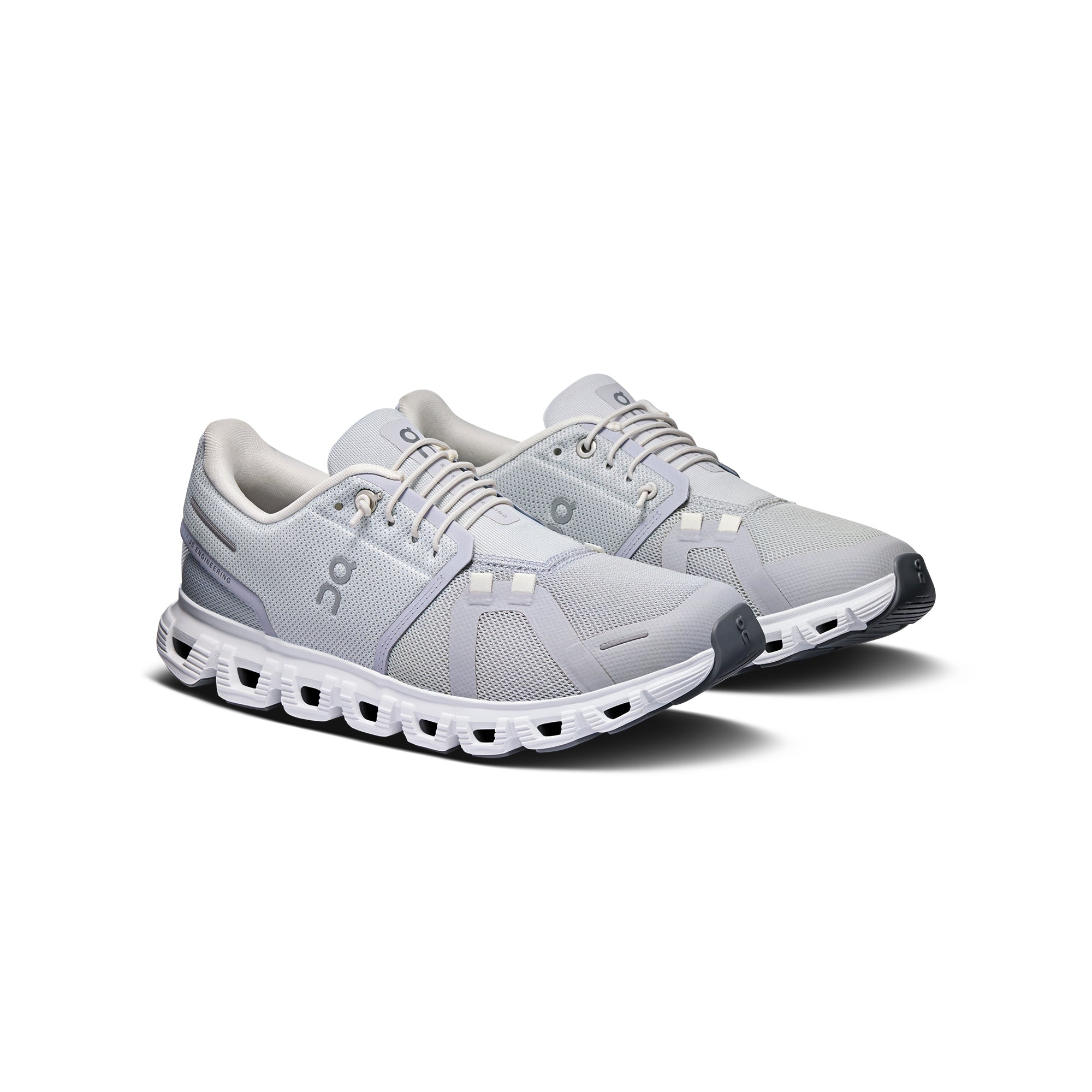 Glacier grey and white sneakers on a white background 