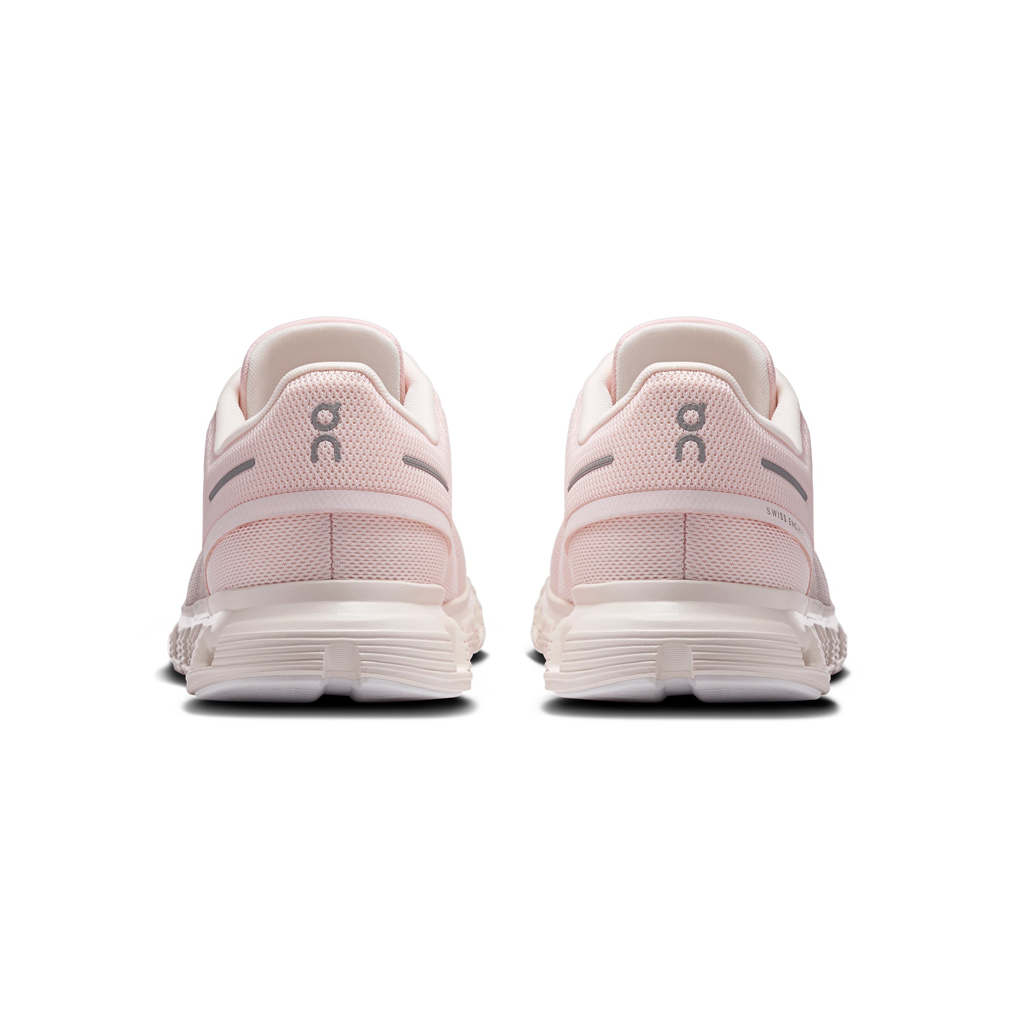 pink and white sneakers on a white background