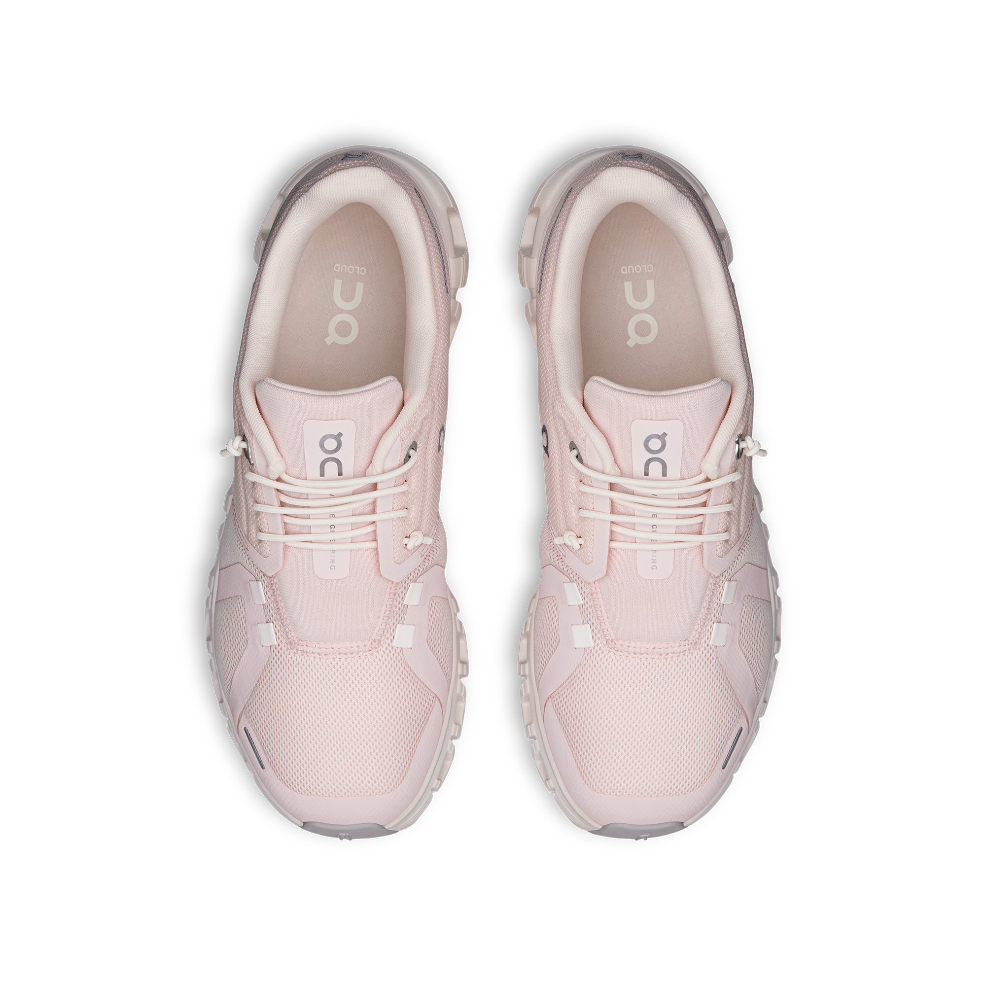 pink and white sneakers on a white background