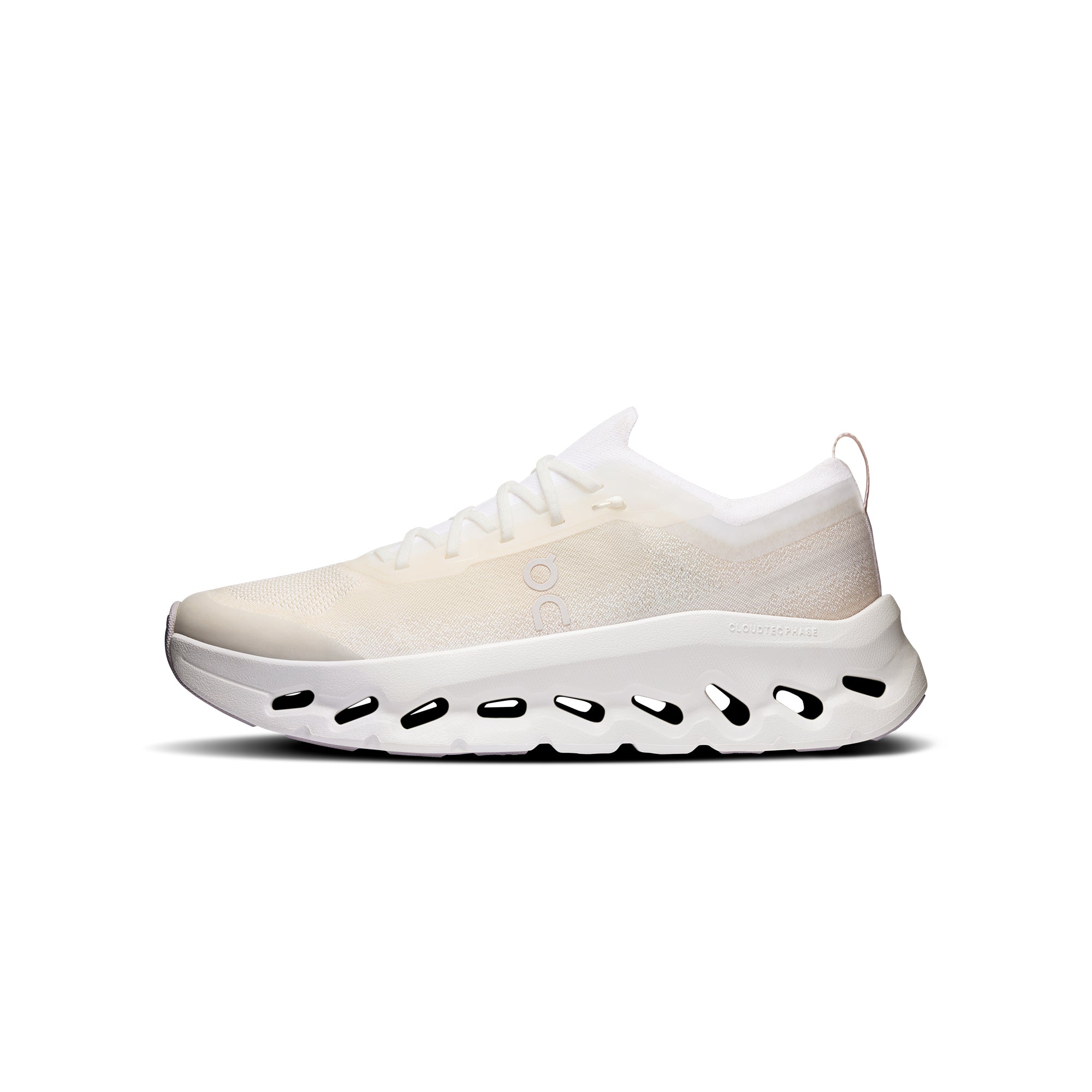 white tan sneakers on a white background