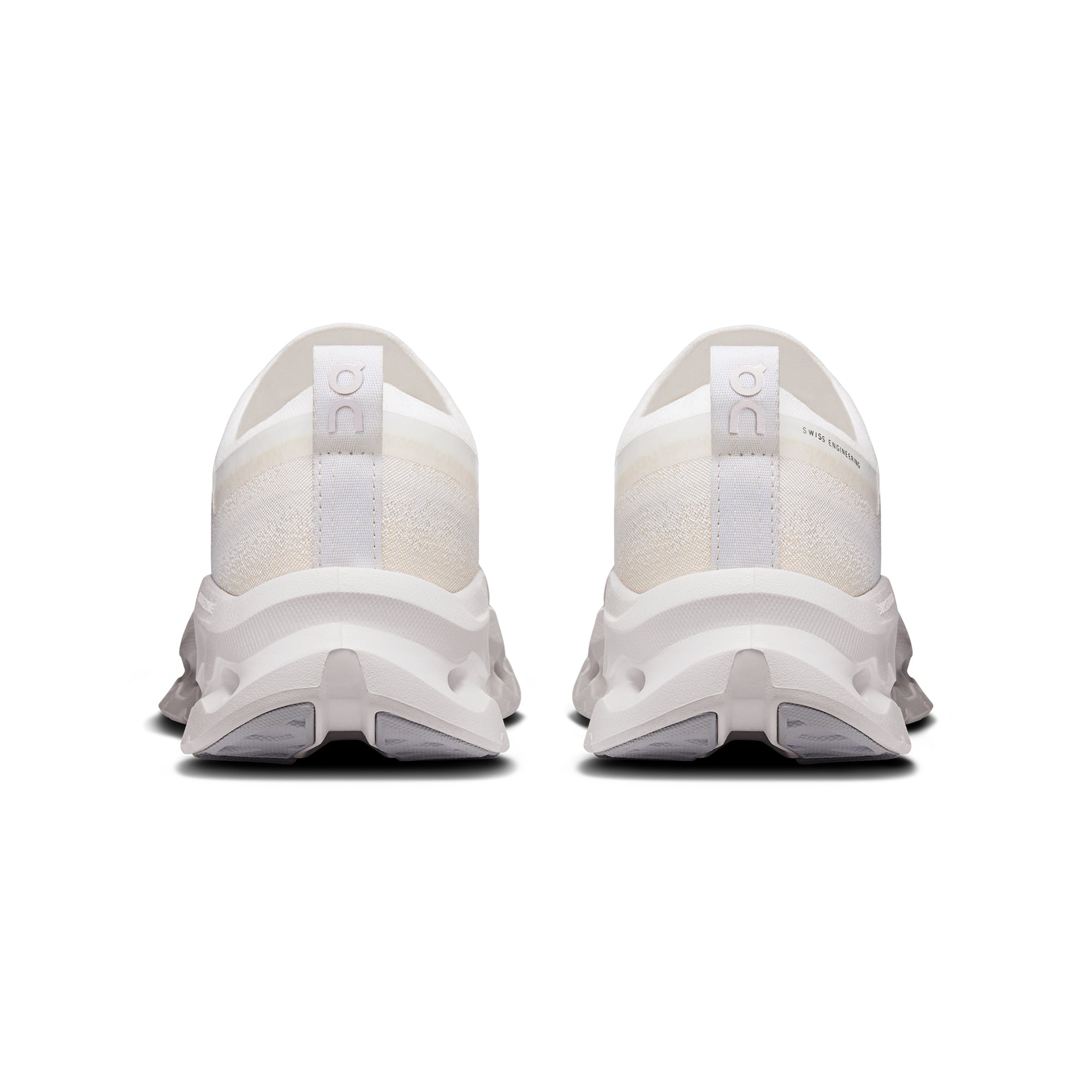 white tan sneakers on a white background