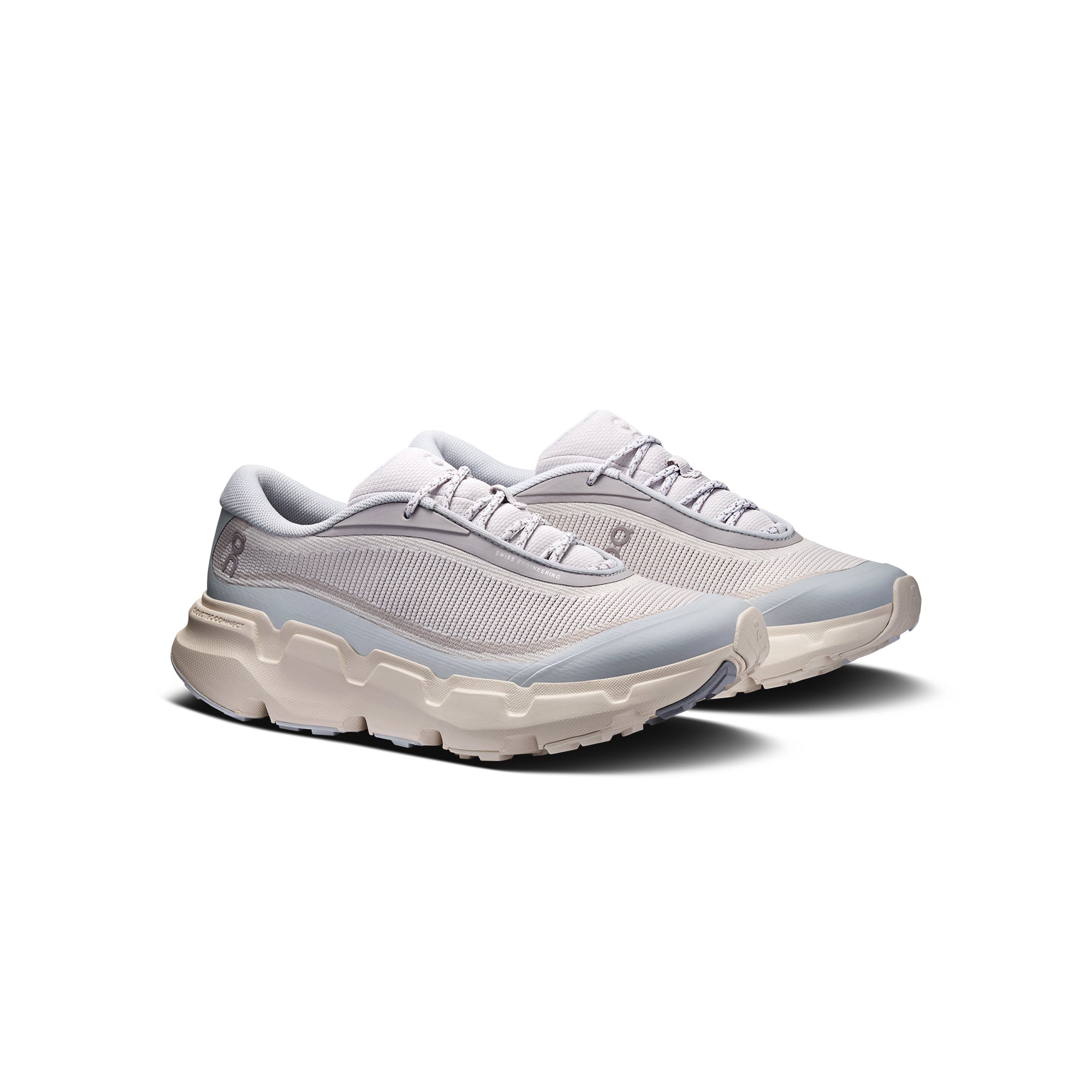 white grey light blue and beige sneakers on a white background