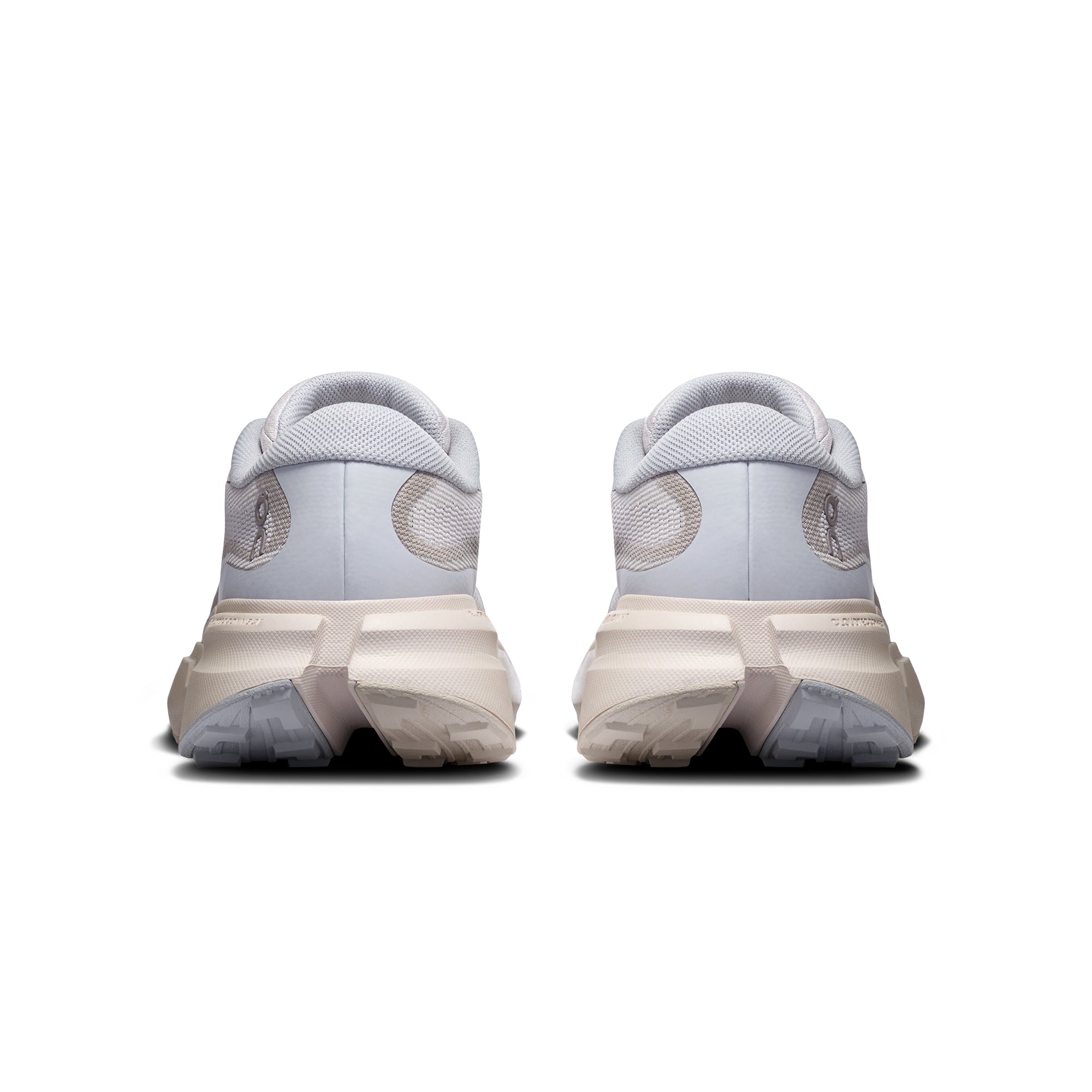 white grey light blue and beige sneakers on a white background