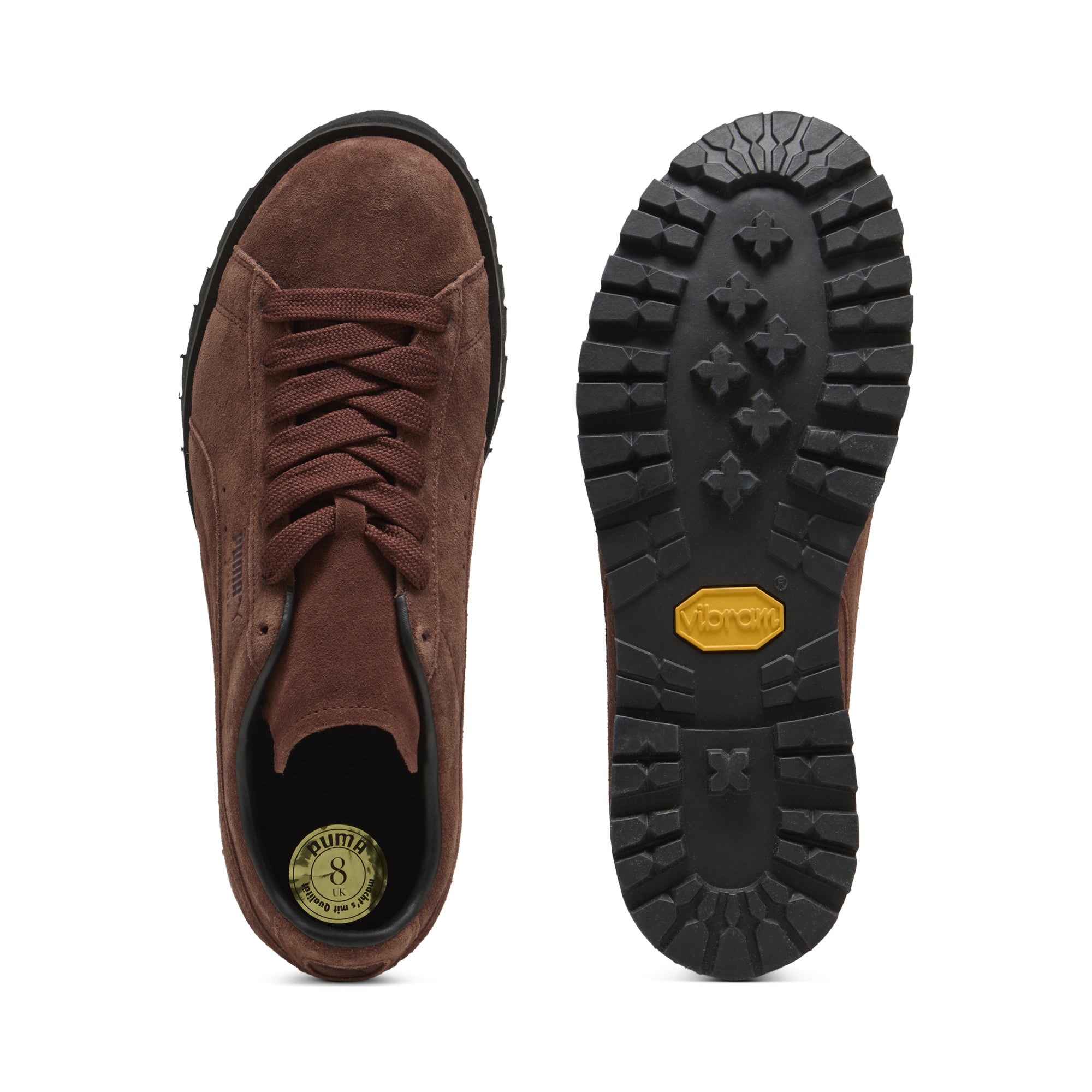brown and black sneakers on a white background