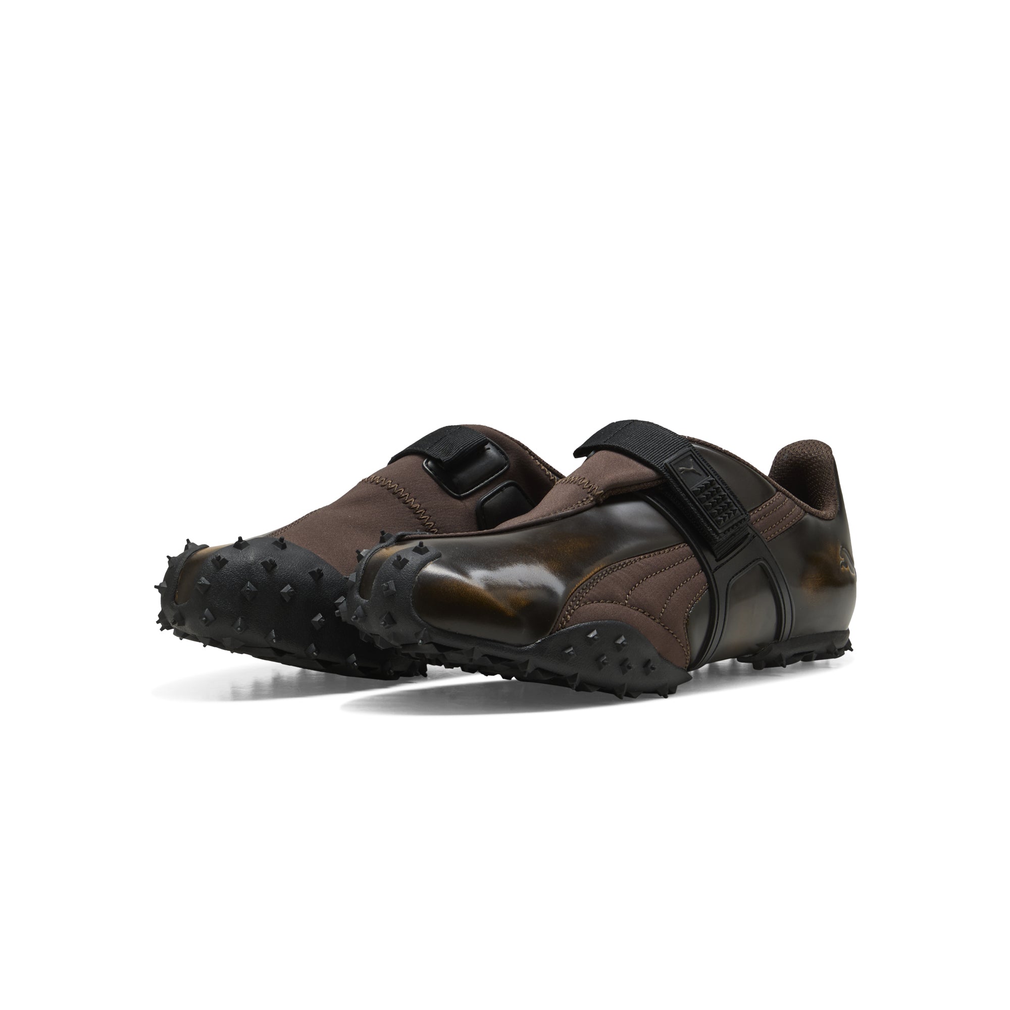 brown and black sneakers on a white background