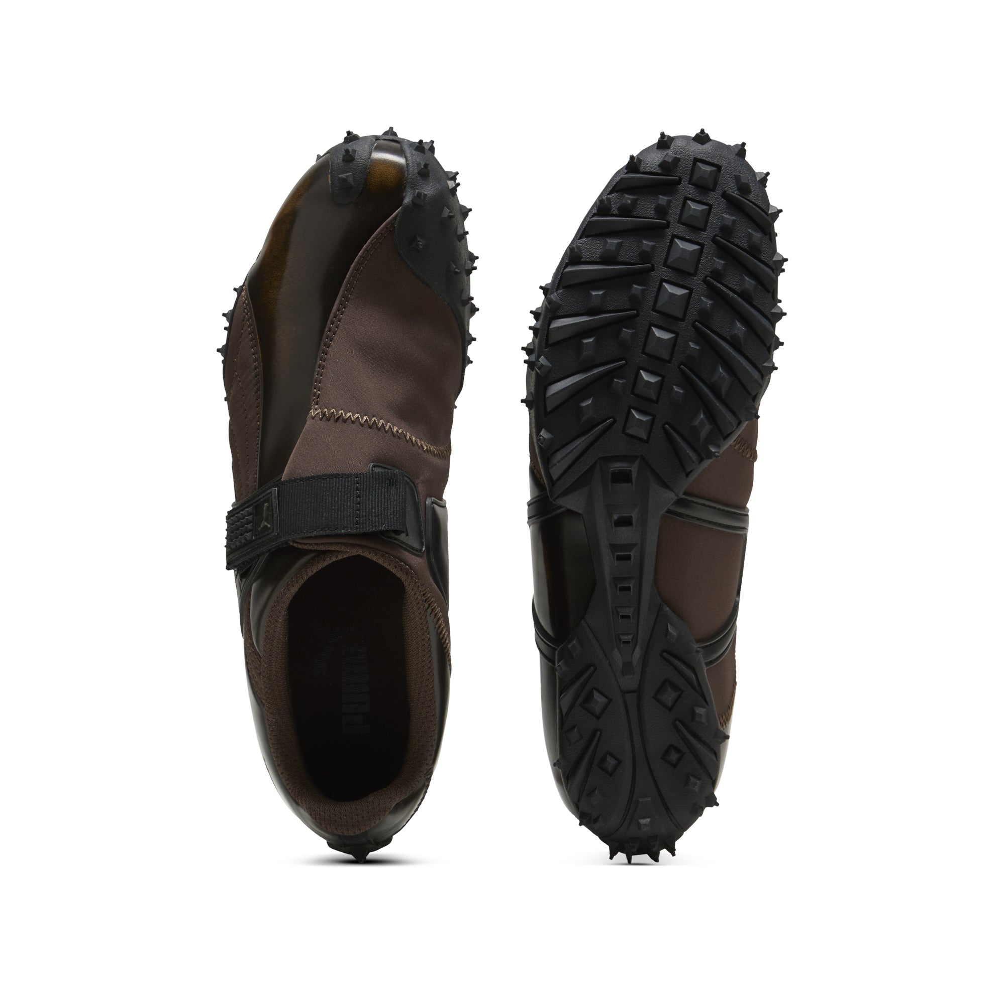brown and black sneakers on a white background