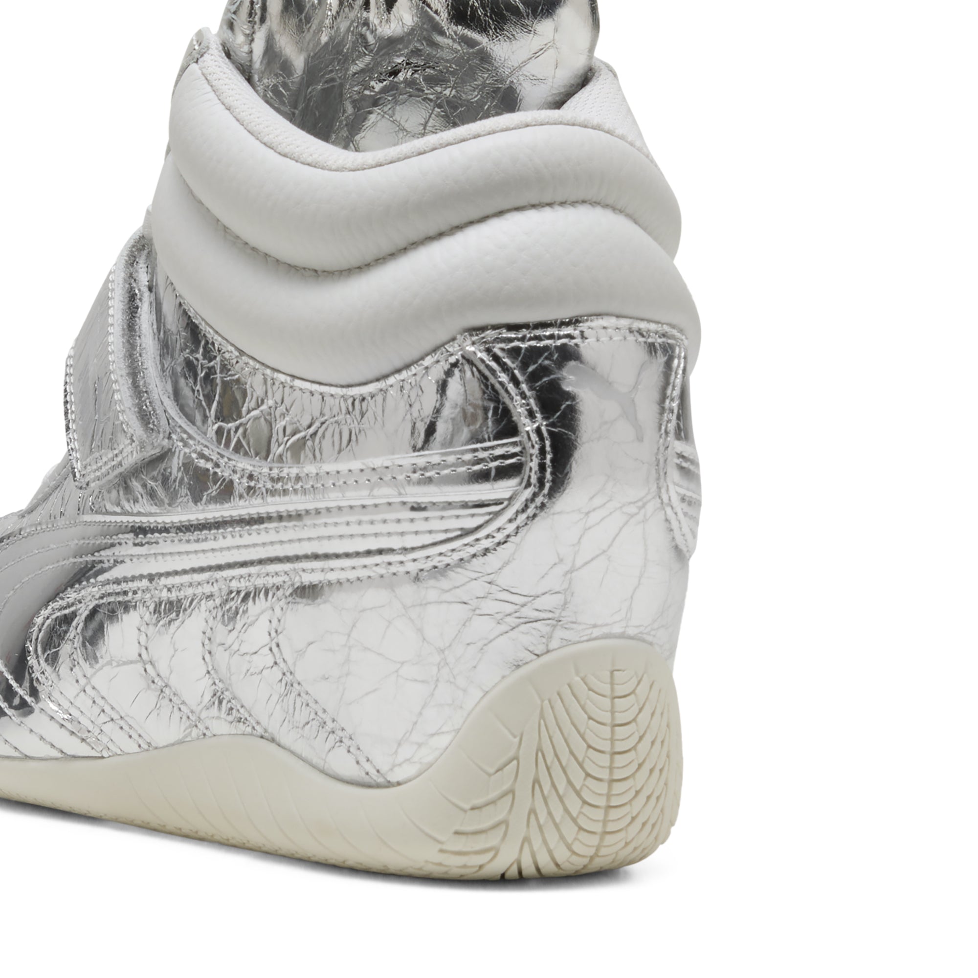 silver and white sneakers on a white background