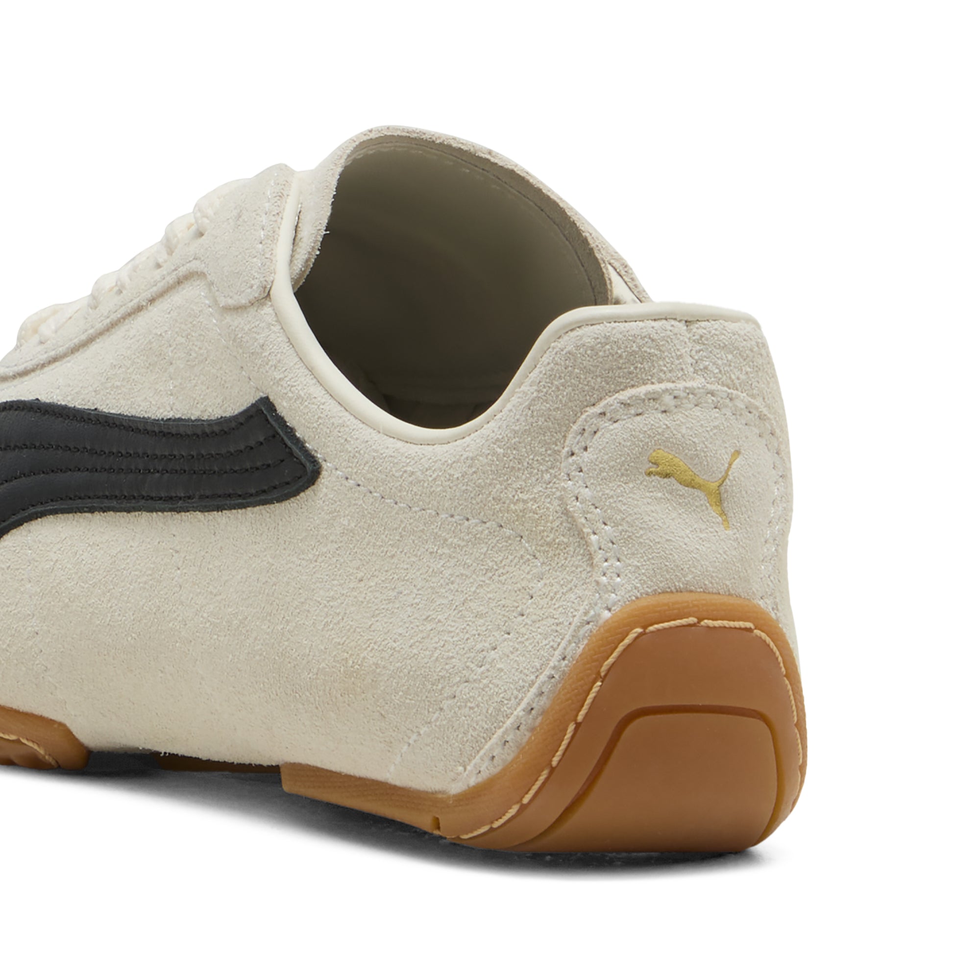 white, black and gum sole sneakers on a white background
