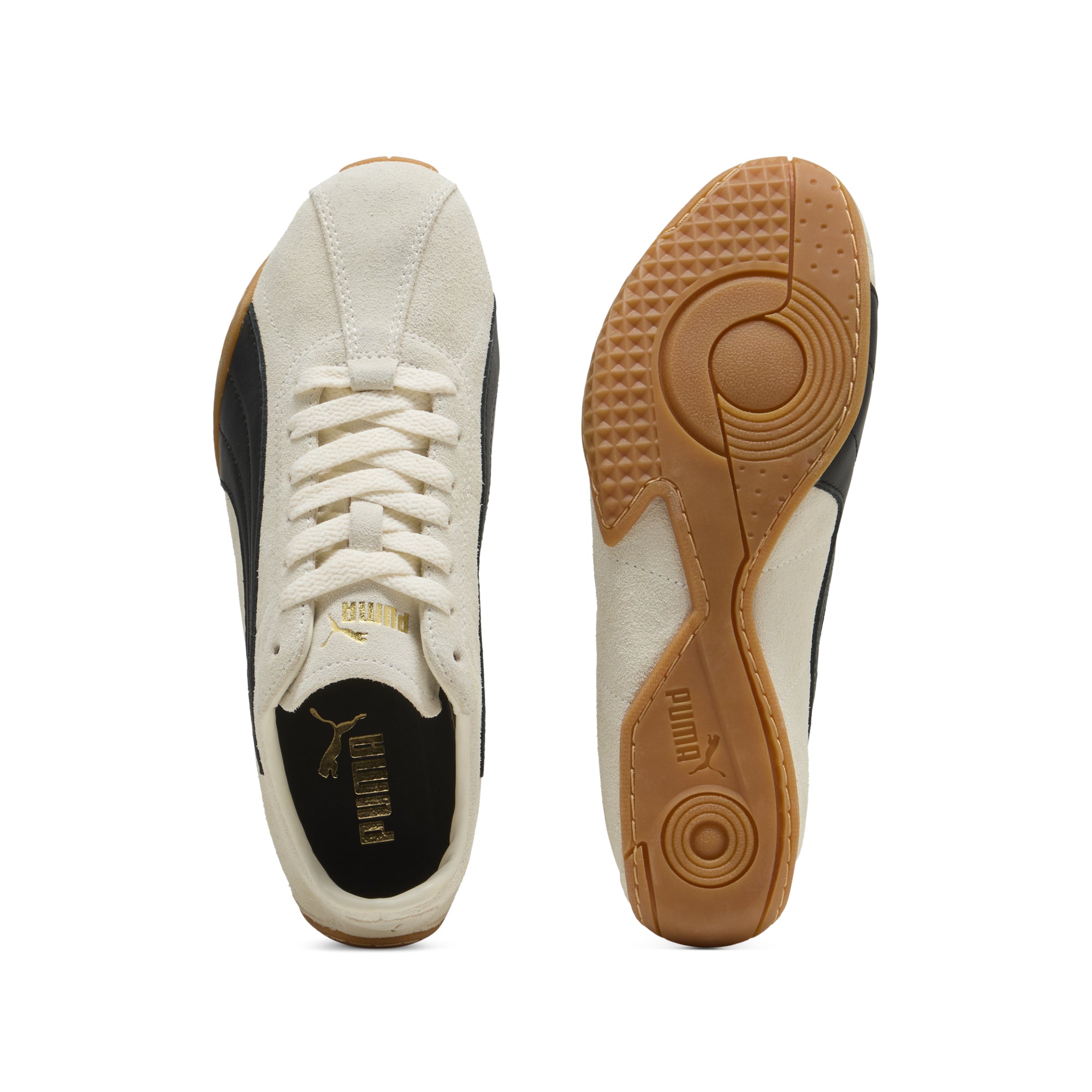 white, black and gum sole sneakers on a white background