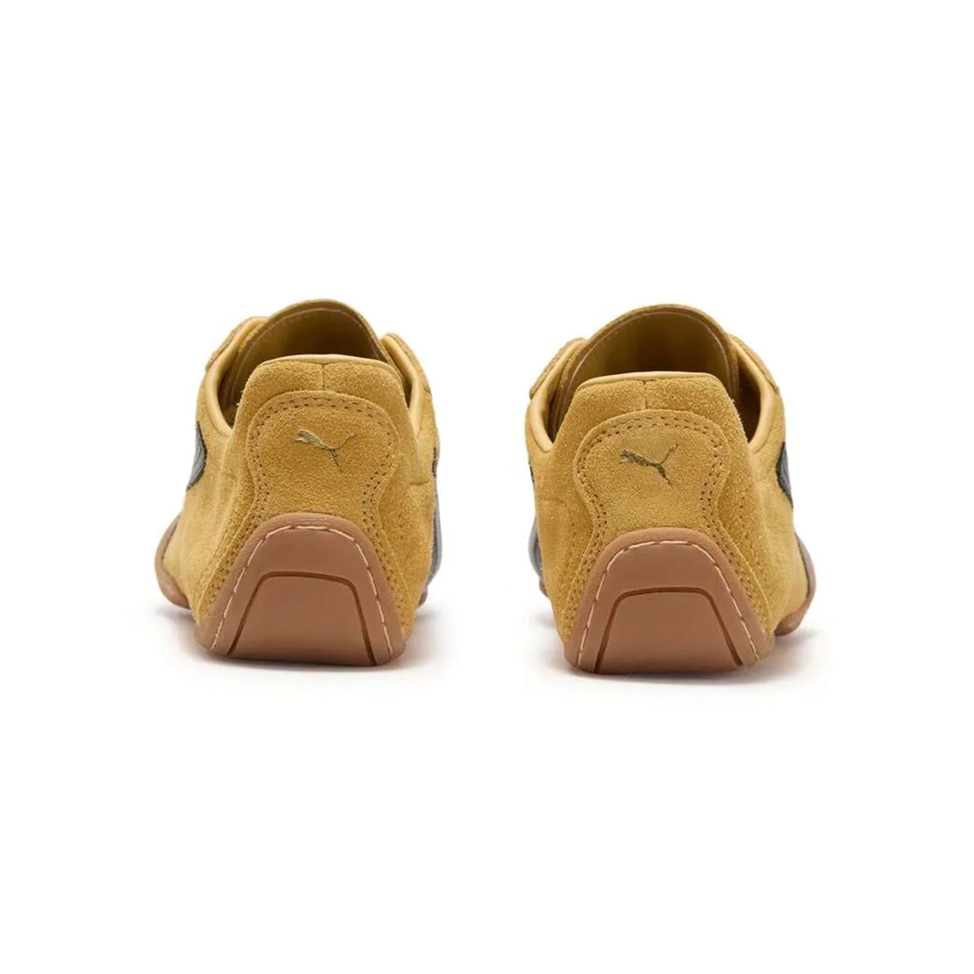 Yellow and black sneakers on a white background