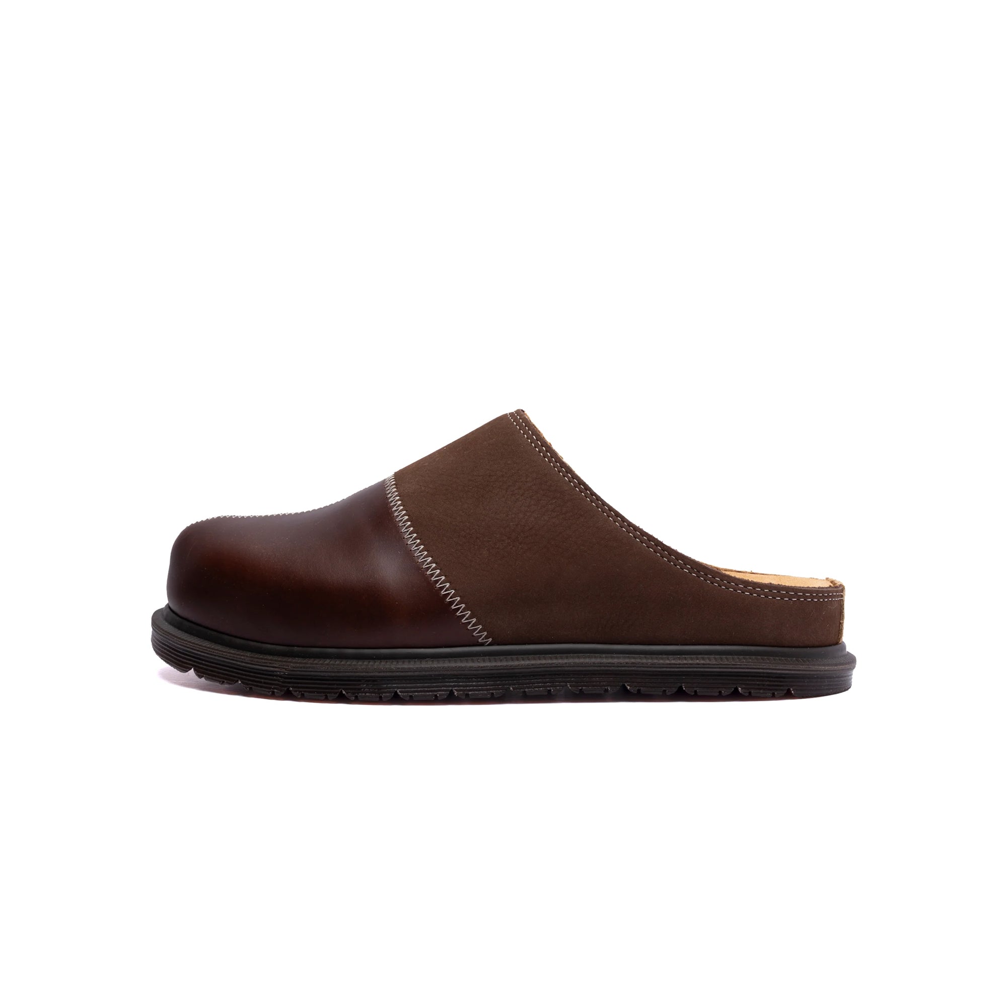 Butterscotch dark Mules on a white background