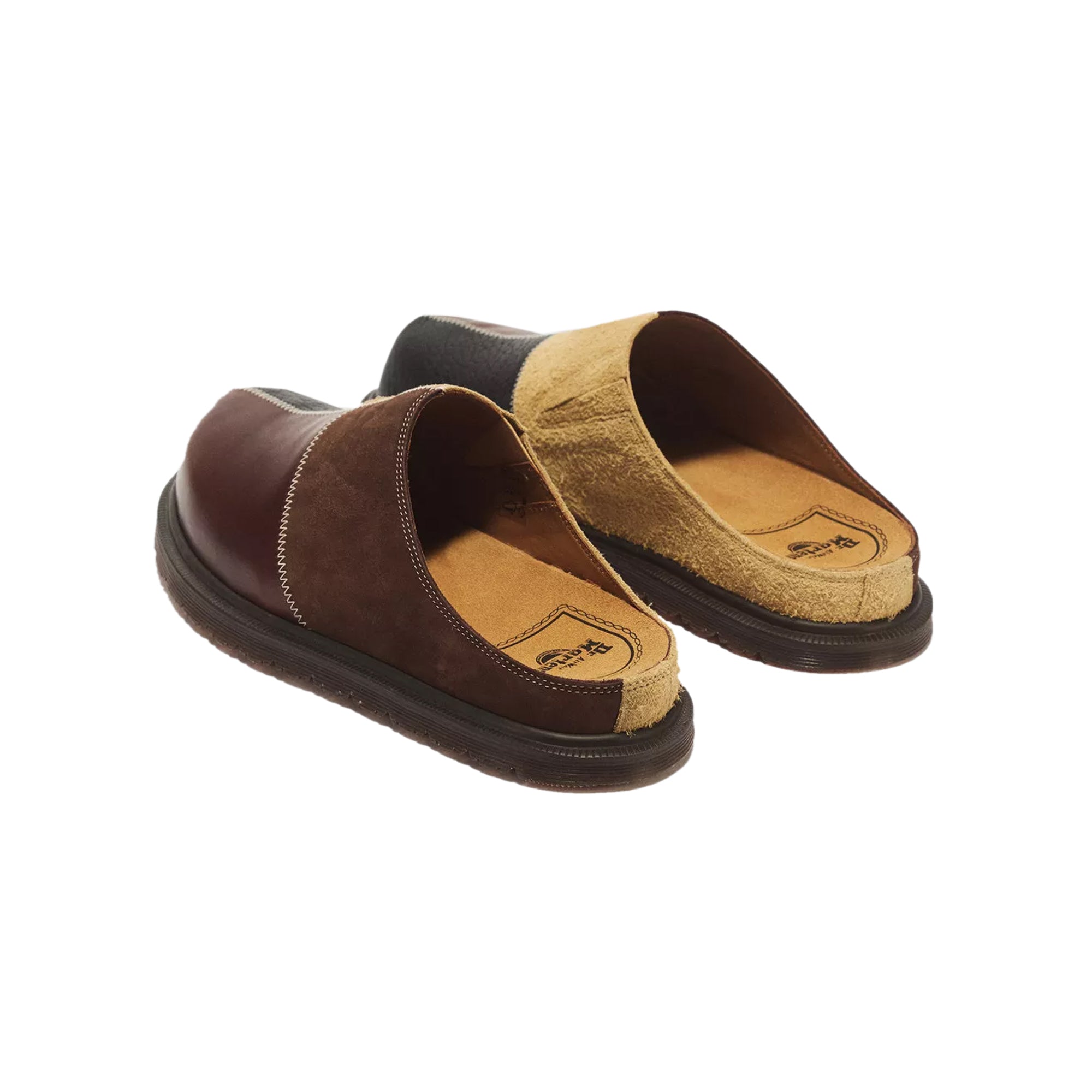 Butterscotch dark Mules on a white background