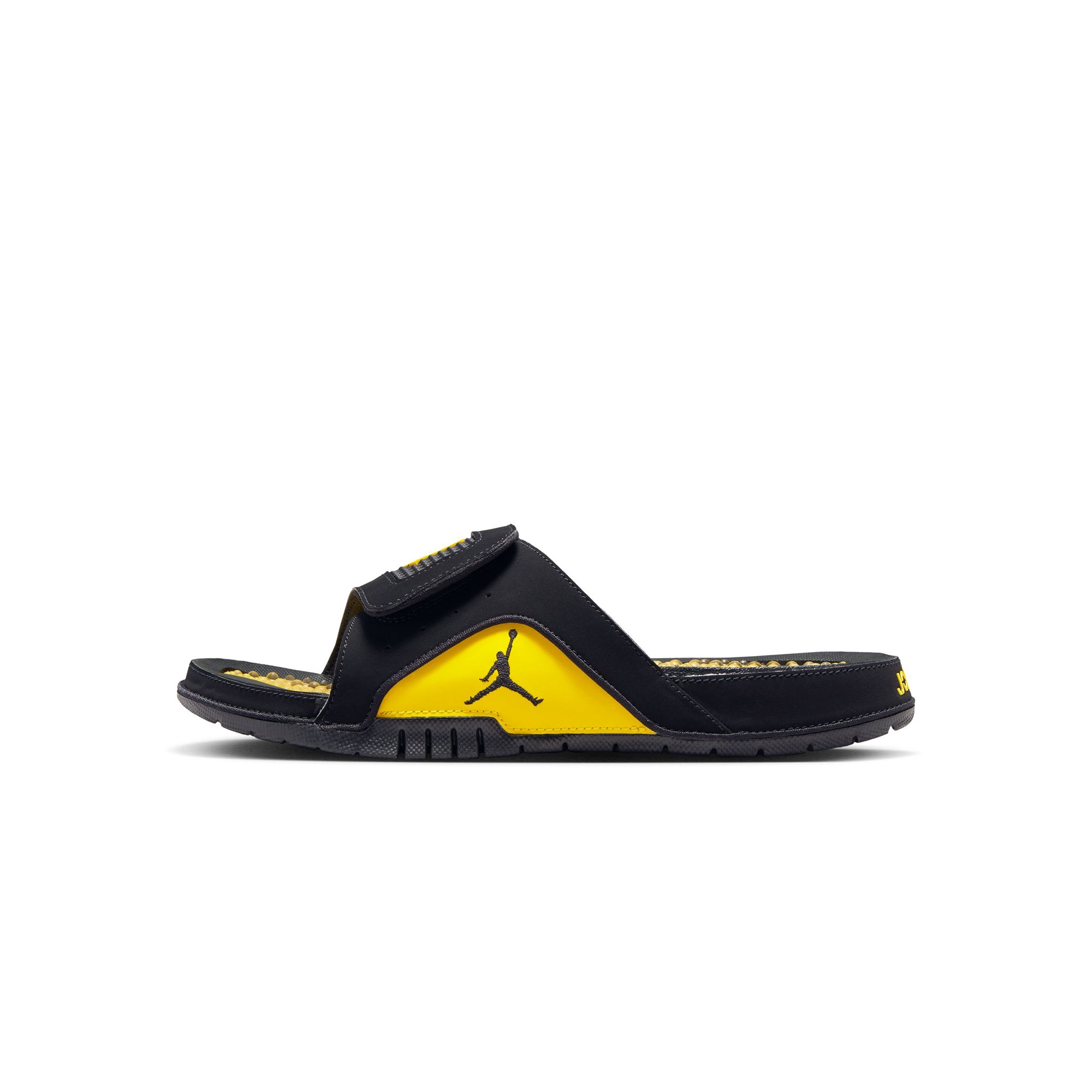 Black/tour Yellow Slides on a white background