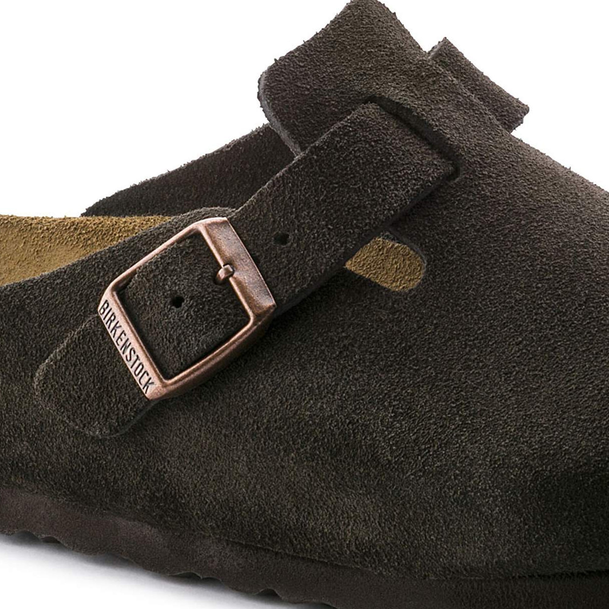 Brown Soft Footbed Sandal with metal pin buckle on a white background