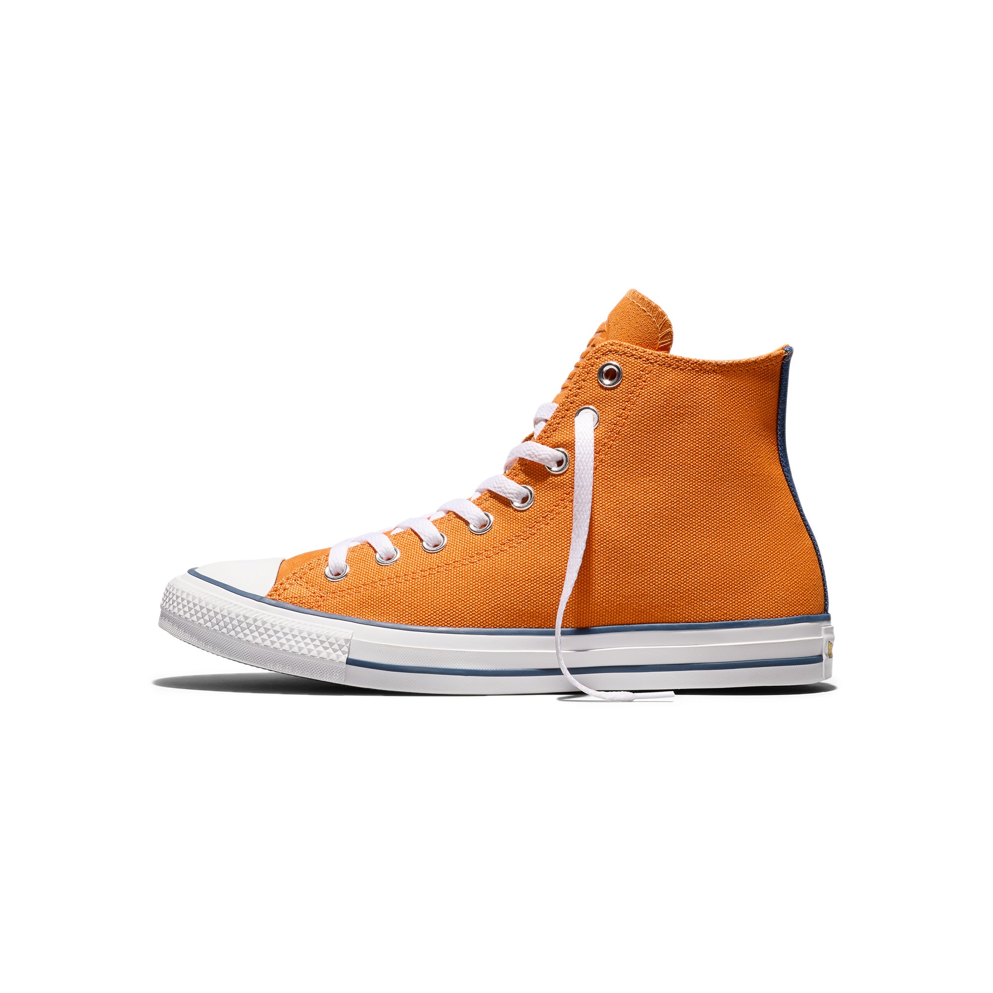 orange white and blue sneakers on a white background
