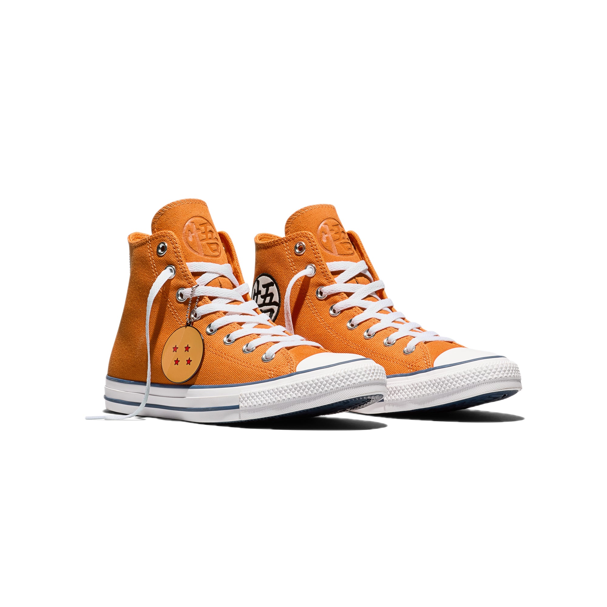 orange white and blue sneakers on a white background