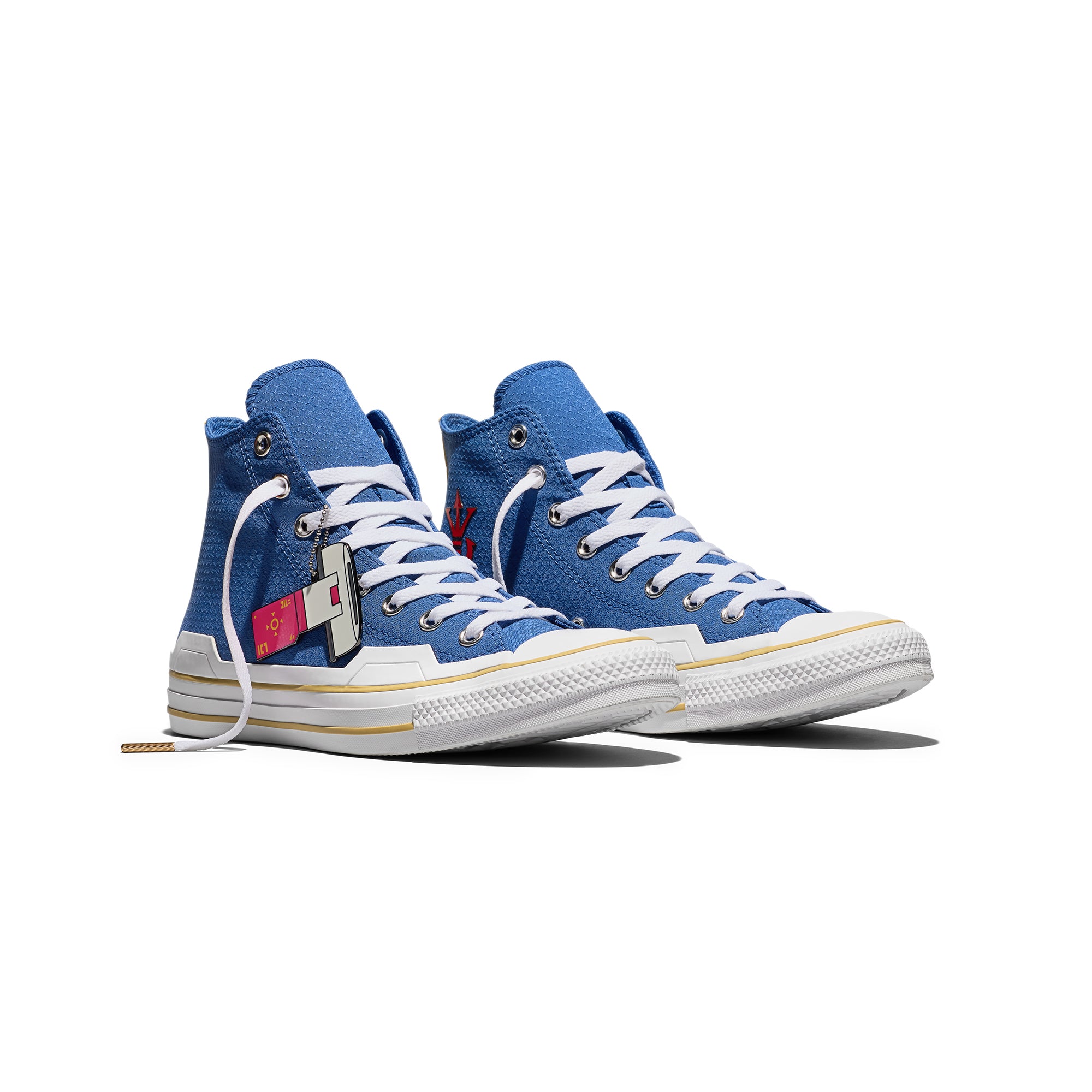 blue white yellow and red sneakers on a white background