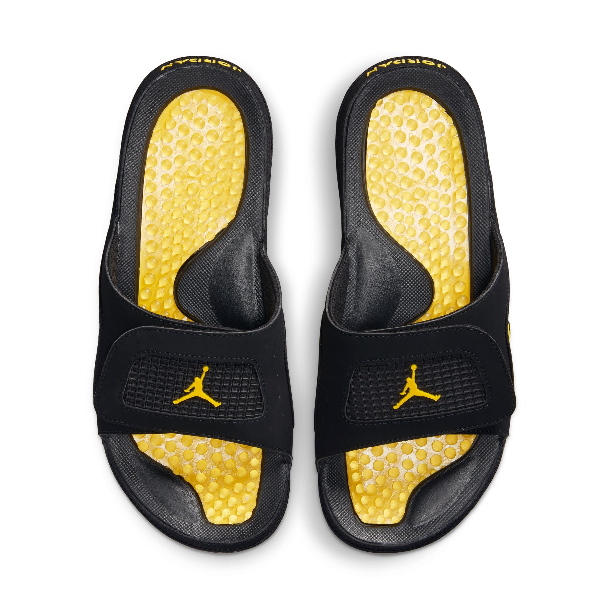 Black/tour Yellow Slides on a white background