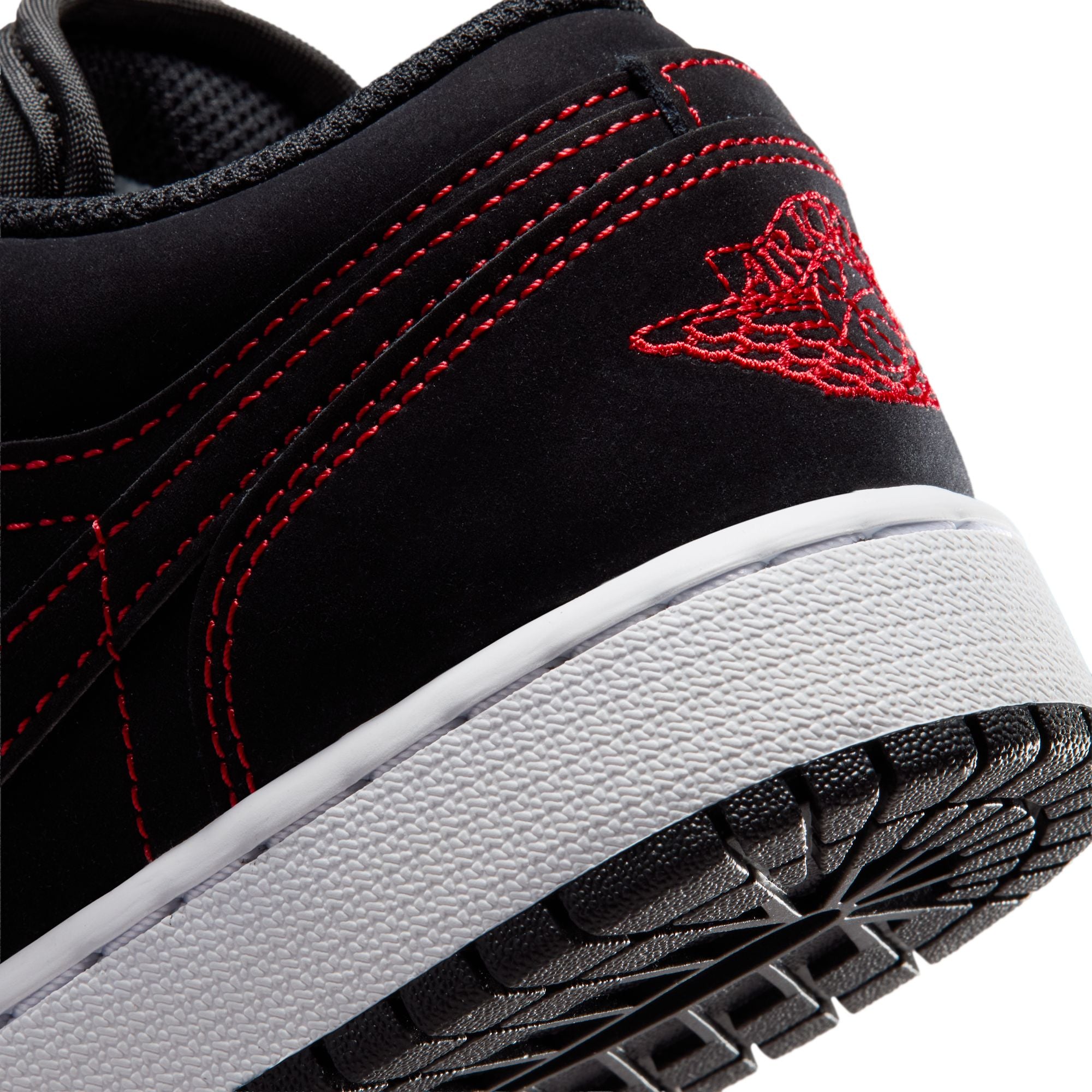 Black/university Red-white Sneakers on a white background
