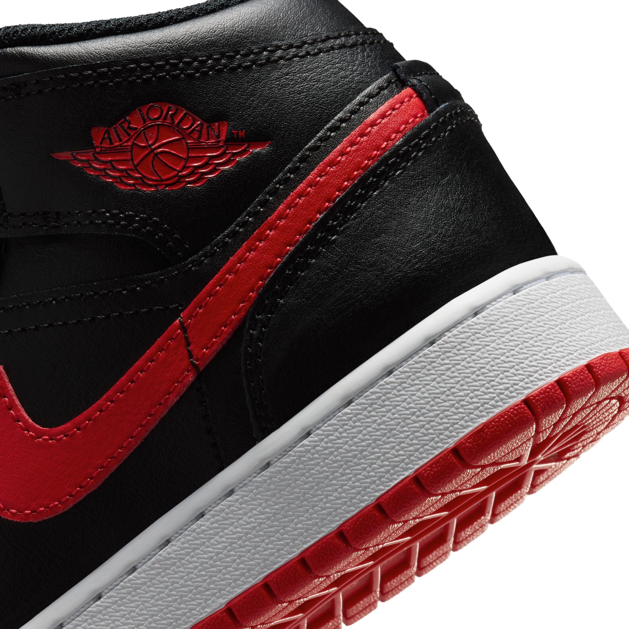 Black/university Red-white Sneakers on a white background