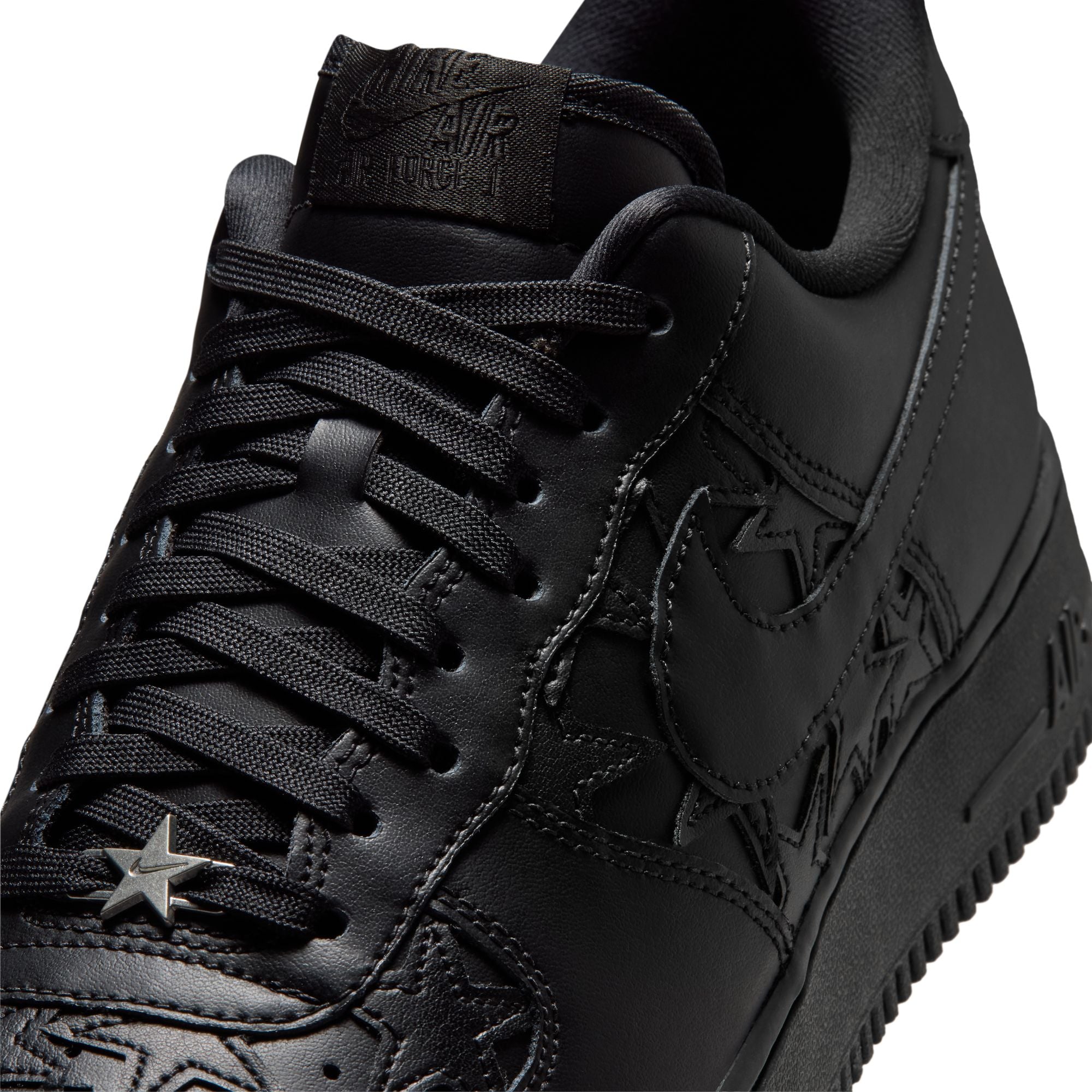 black sneakers on a white background