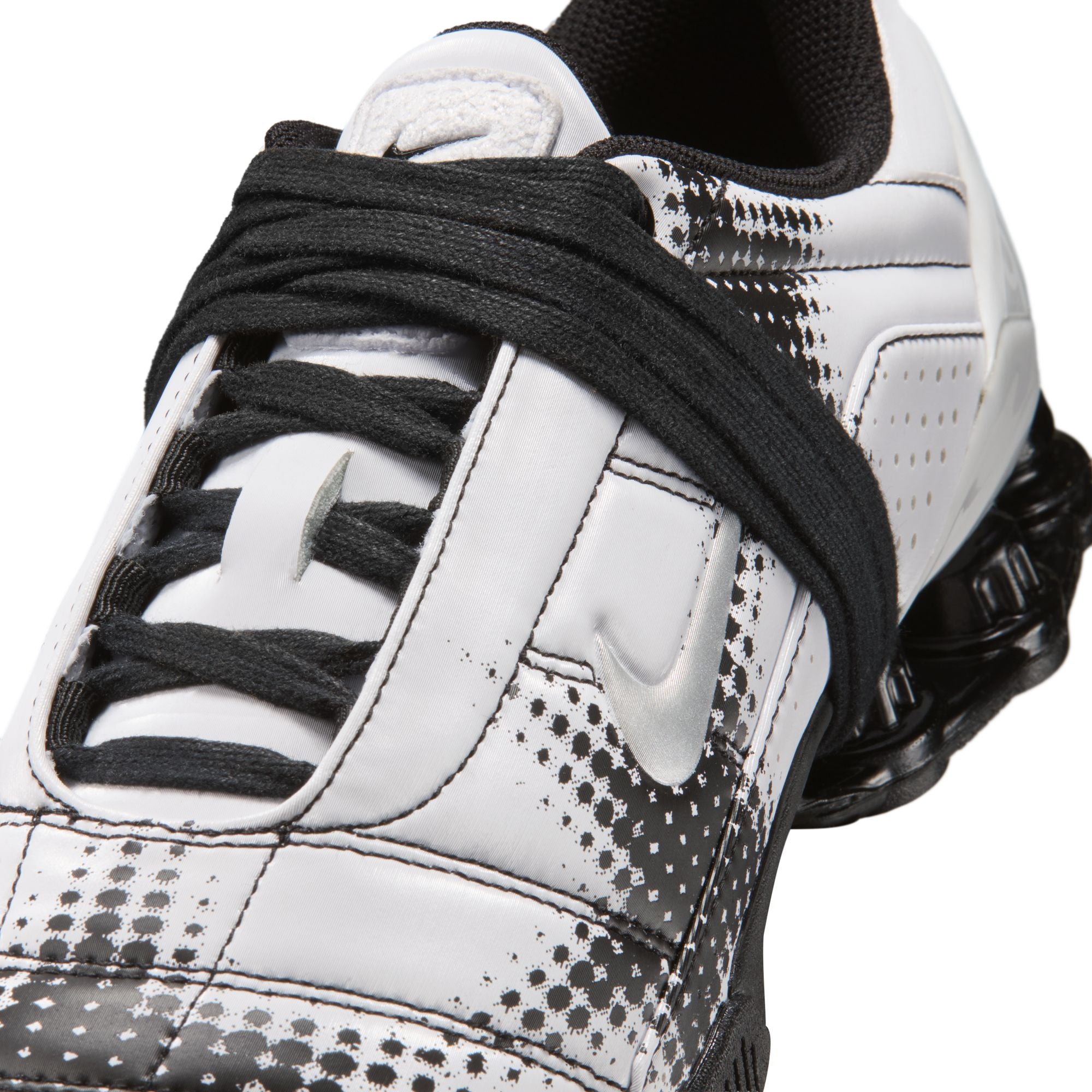 white and black sneakers on a white background