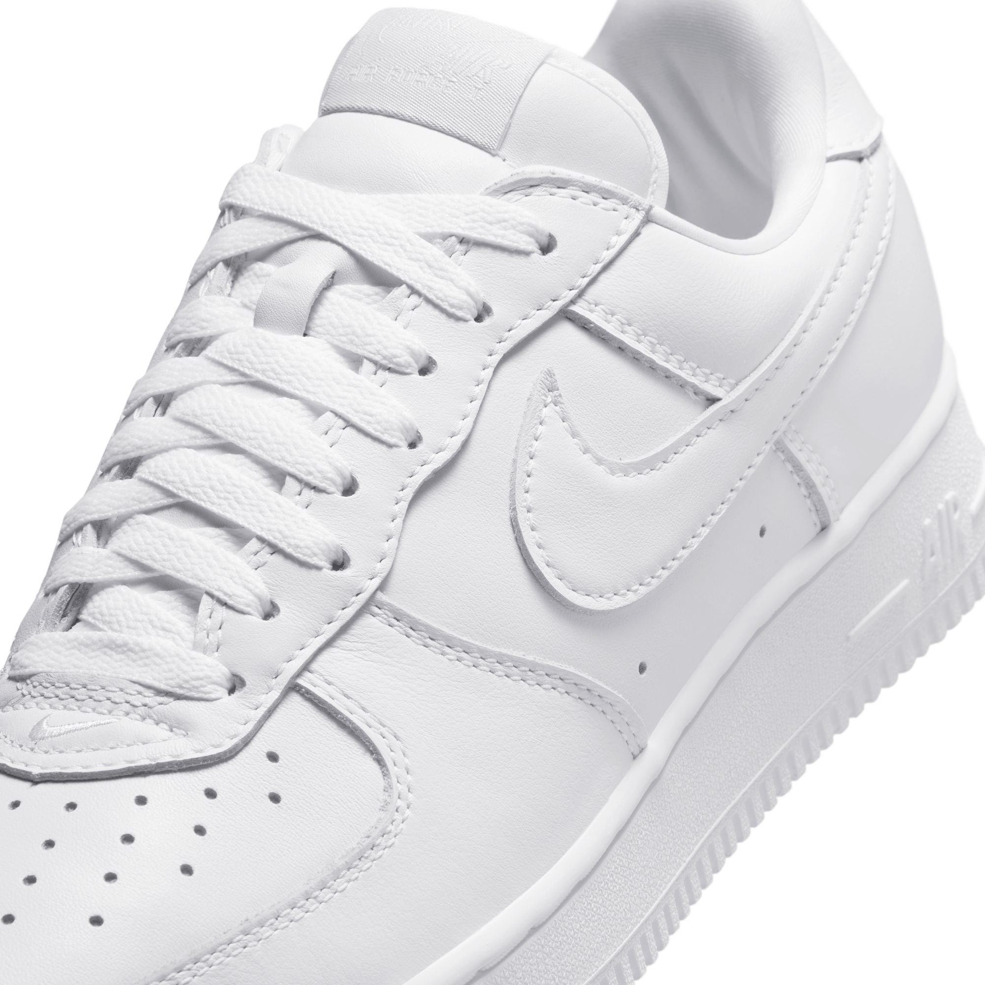 White sneakers on a white background
