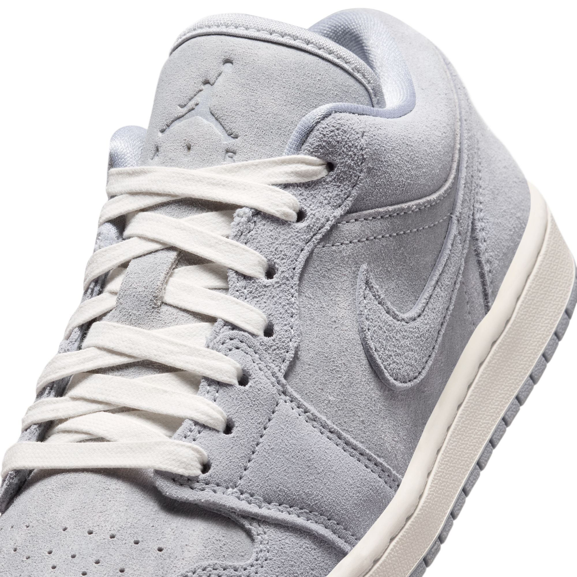 blue grey and white sneakers on a white background