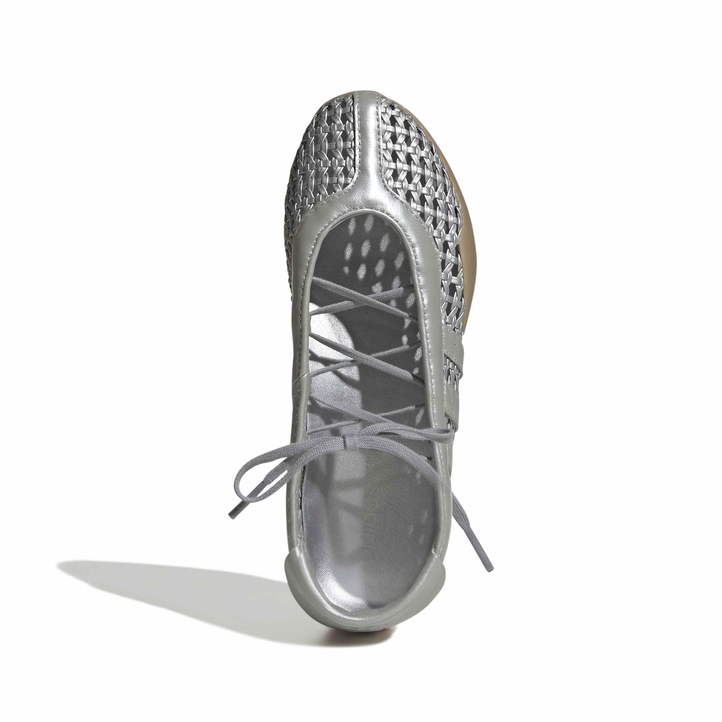 silver and gum ballet sneakers on a white background