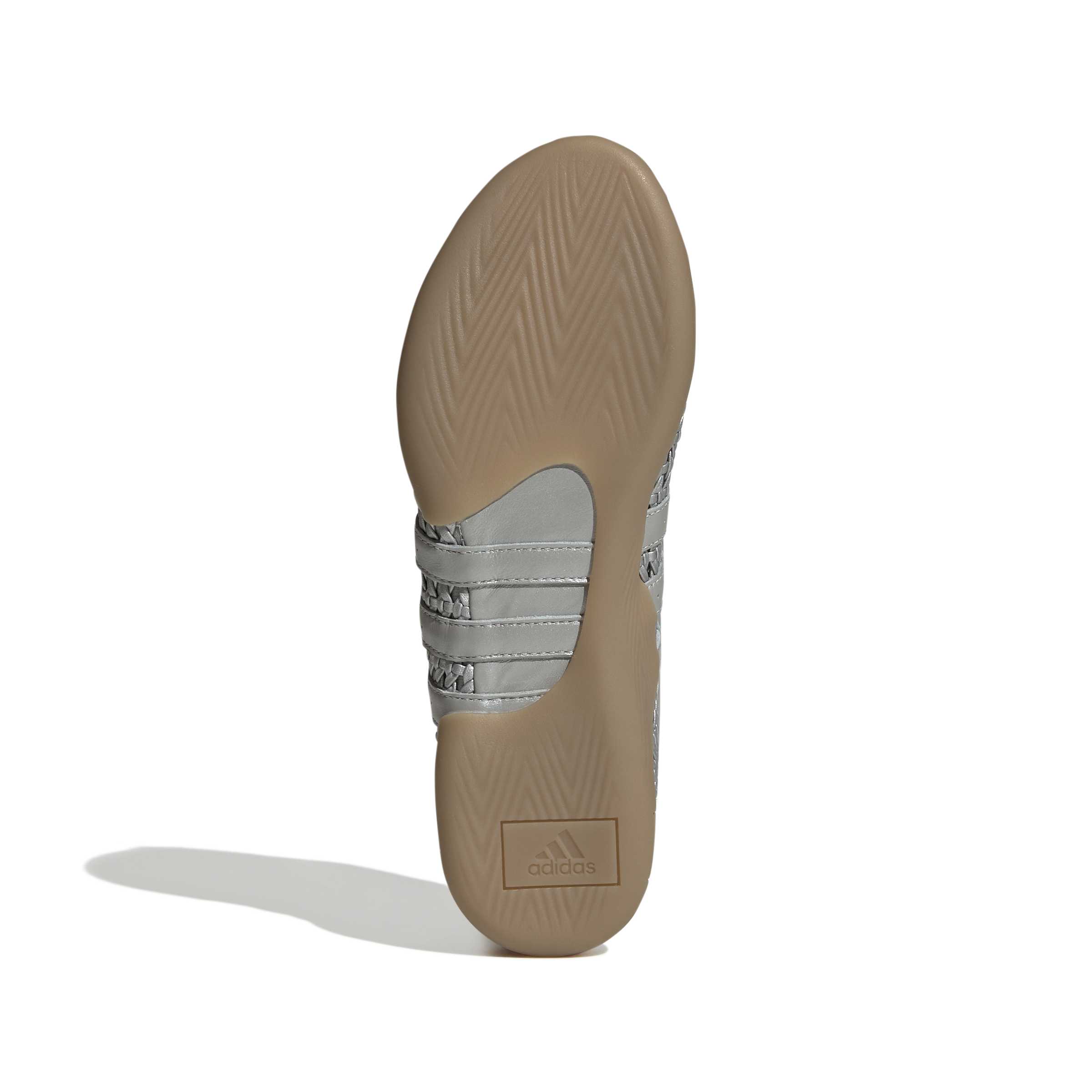 silver and gum ballet sneakers on a white background