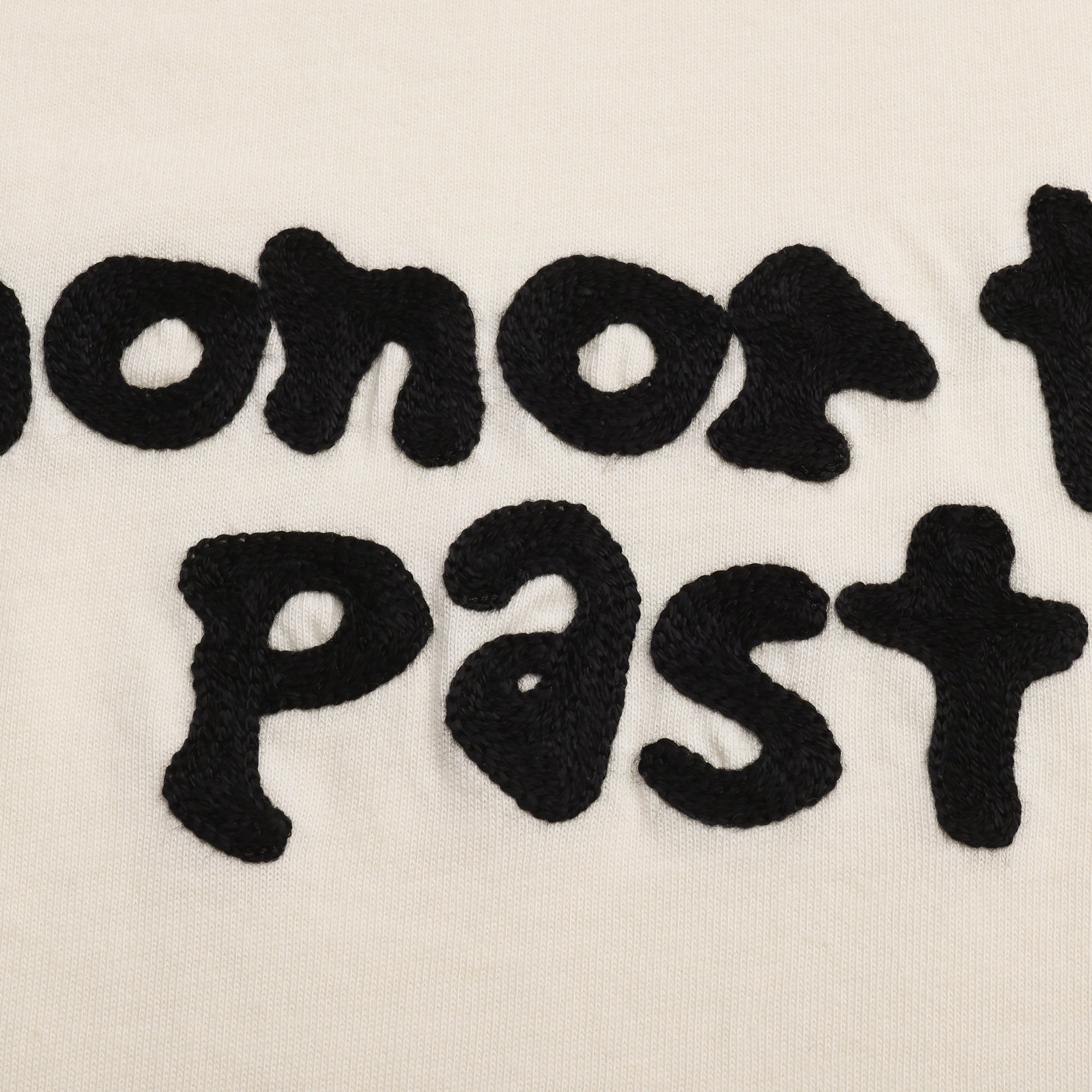 bone and black t-shirt detail